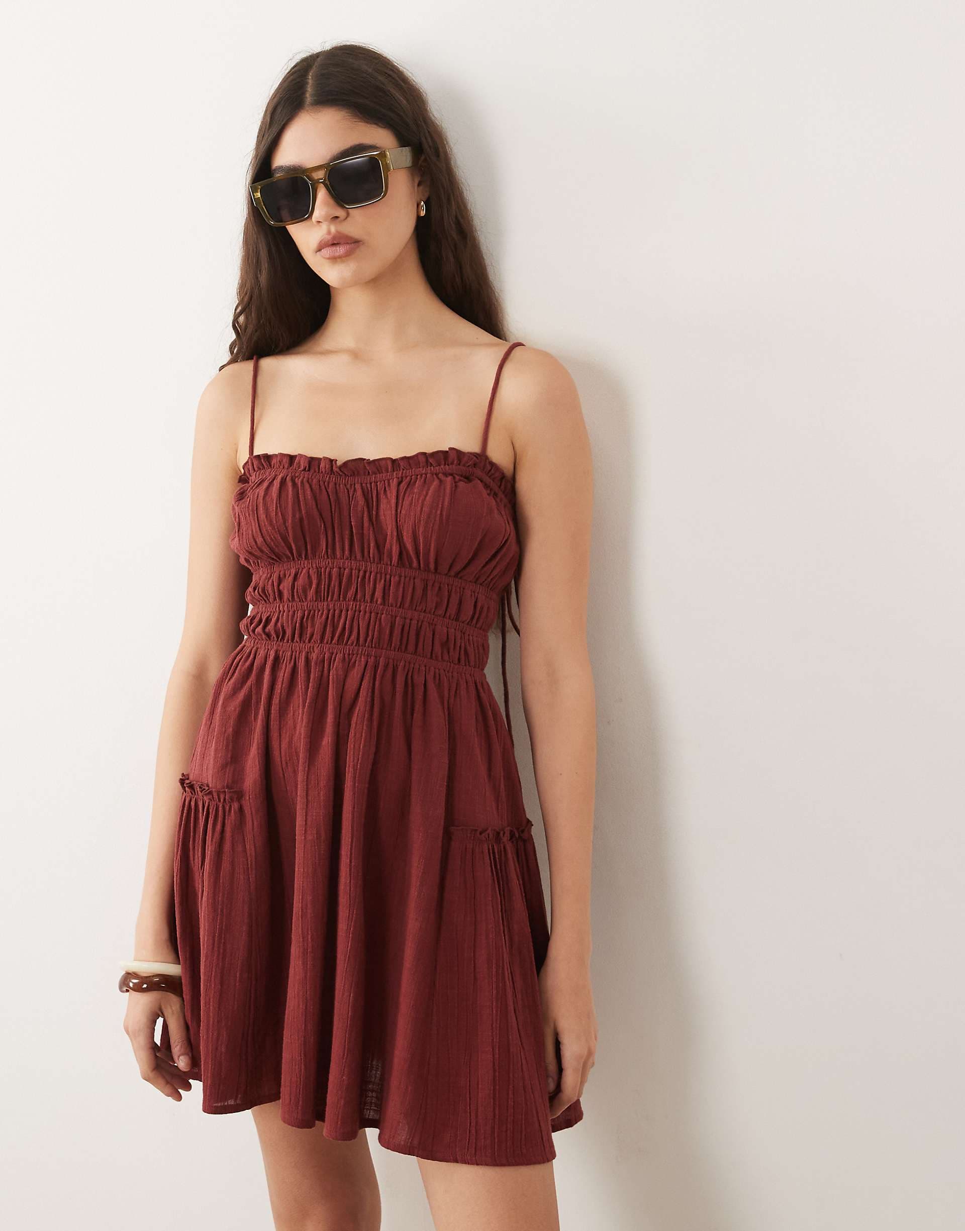 ASOS DESIGN Faith beach shirred mini sundress in burgundy