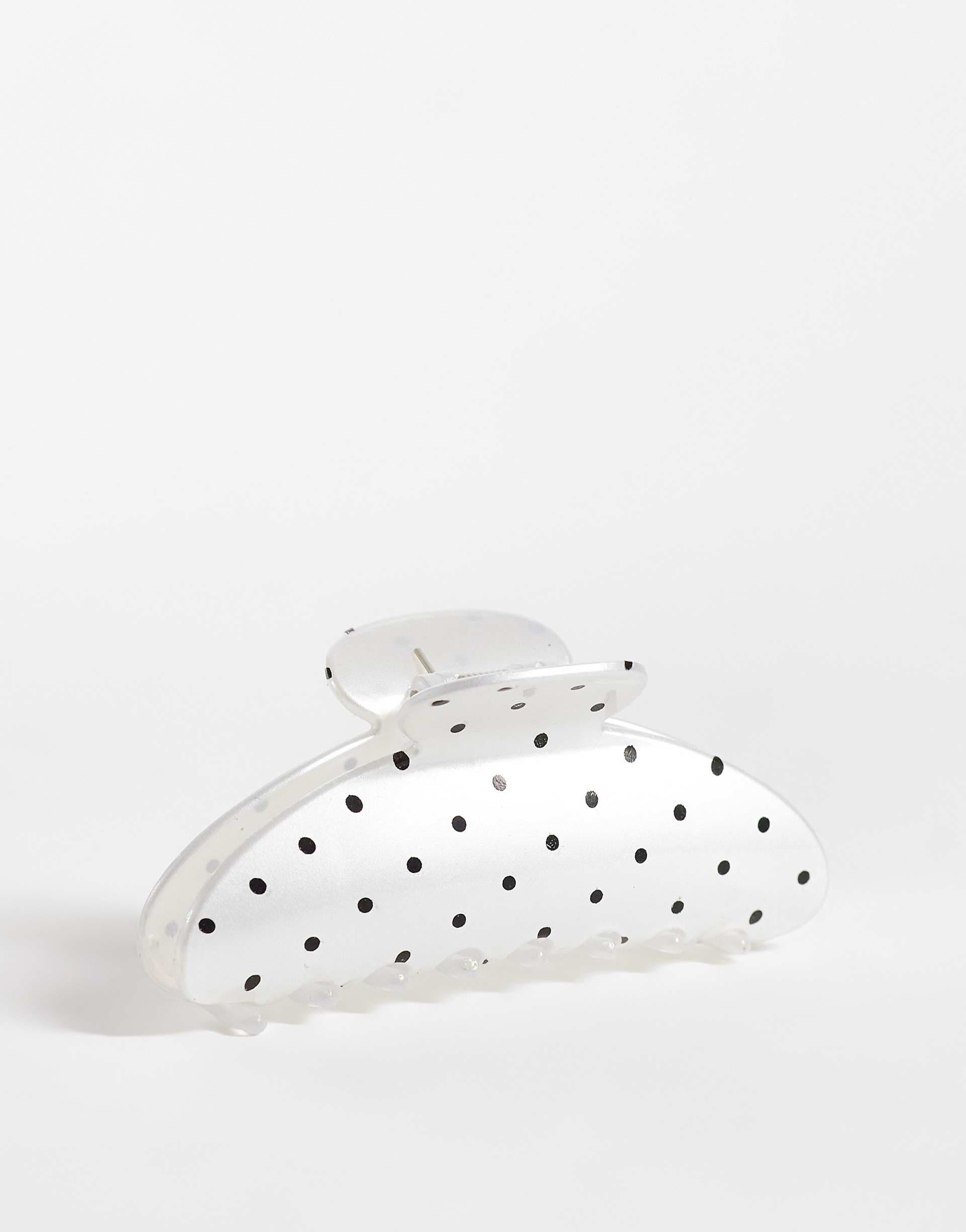 DesignB London polka-dot hair claw clip in white and black