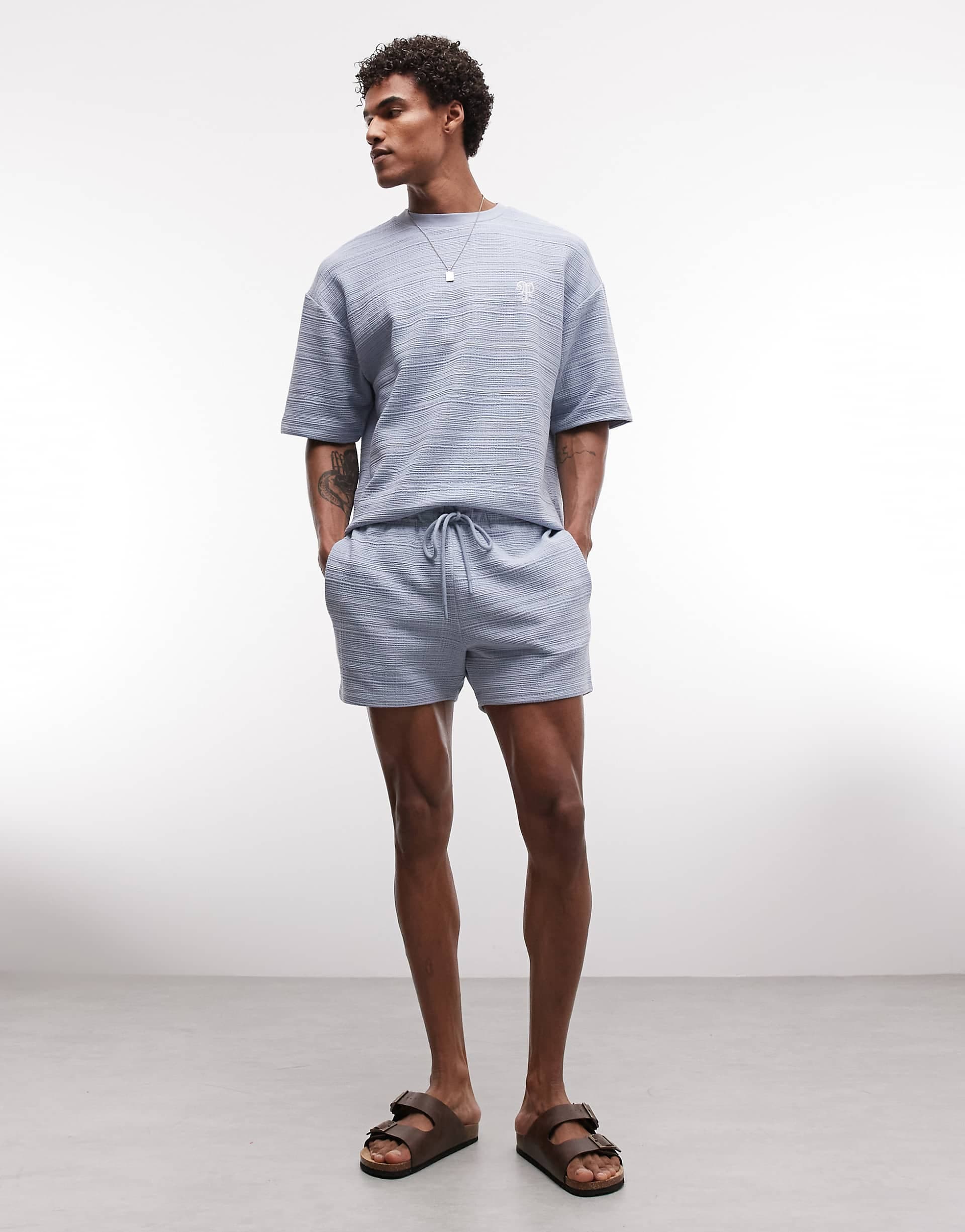 ASOS DESIGN slim crosshatch textured jersey shorts in light blue