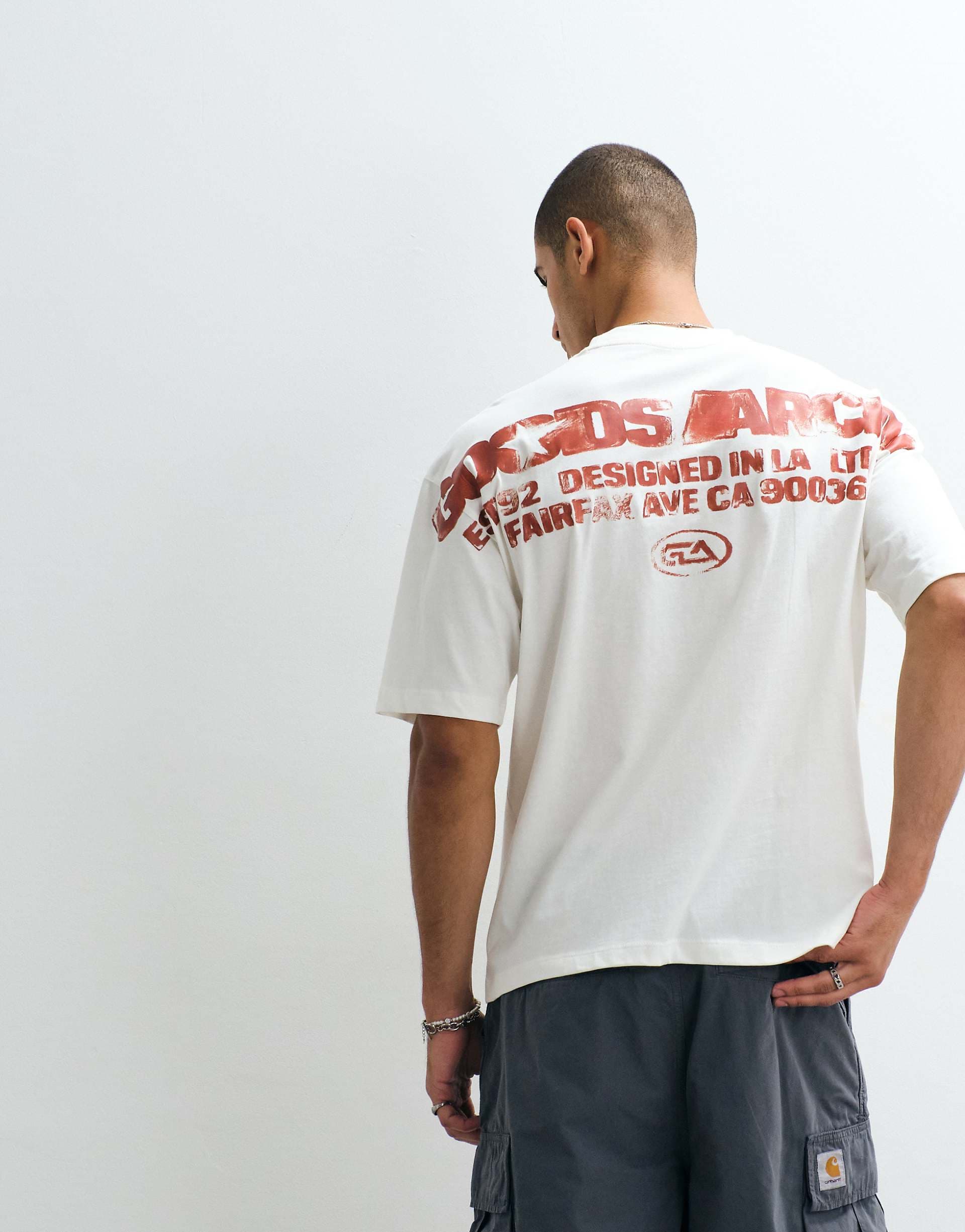 ASOS DESIGN oversized T-shirt with large text graphic in cream