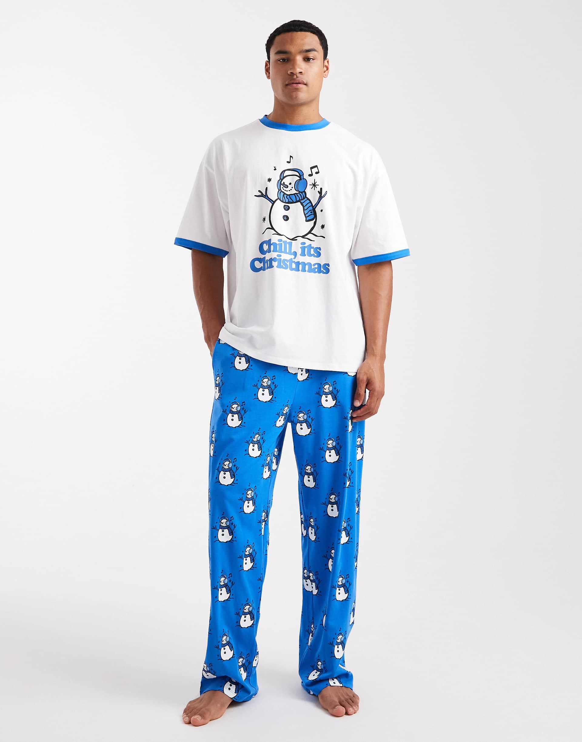 ASOS DESIGN Christmas pajama set with snowman graphic in blue