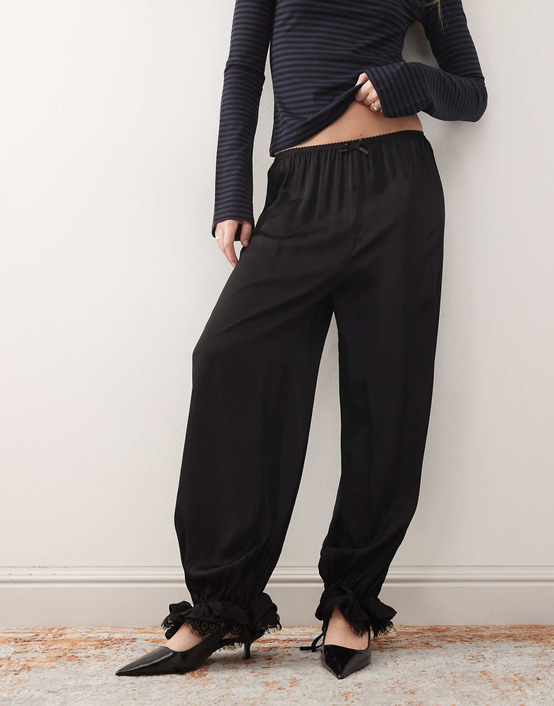 Reclaimed Vintage bubble hem pants with lace trim in black