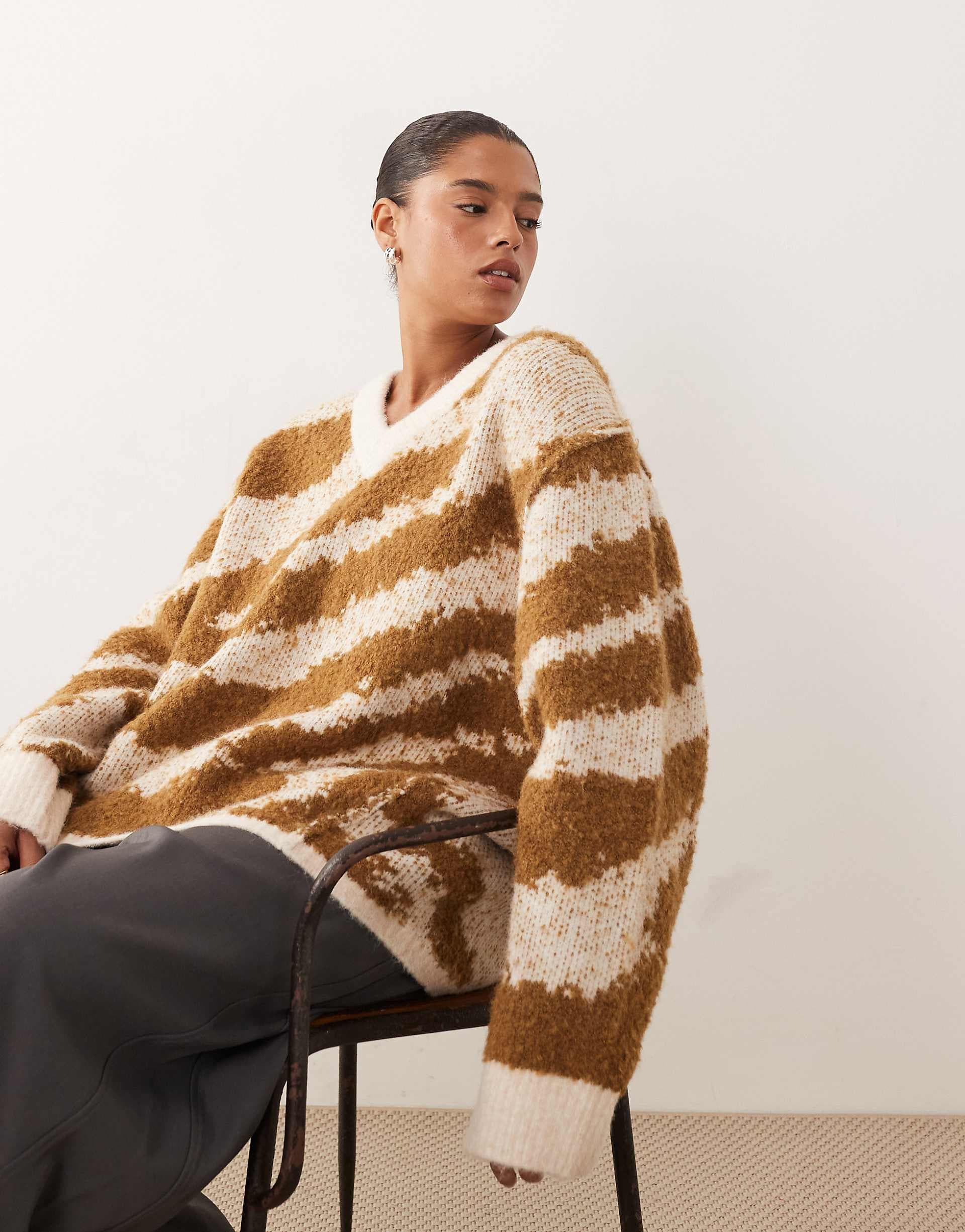 ARRANGE Curve oversized knit v neck sweater with curved hem in toffee & cream tiger antarsia