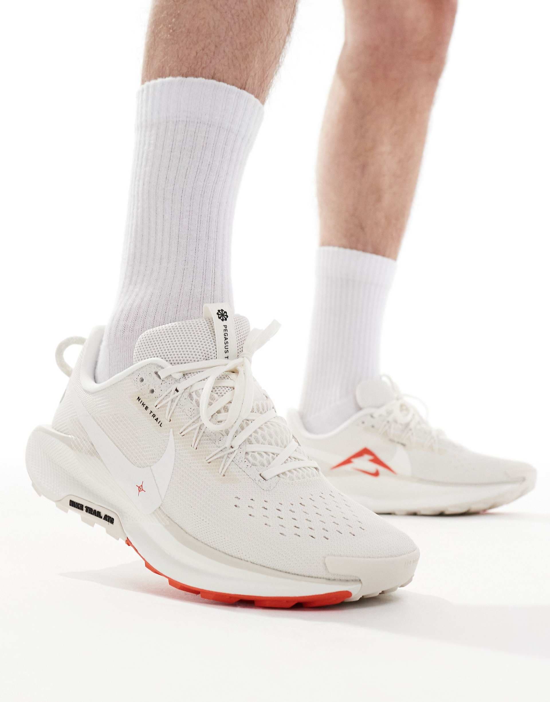 Nike Running ReactX Pegasus Trail 5 sneakers in white and red