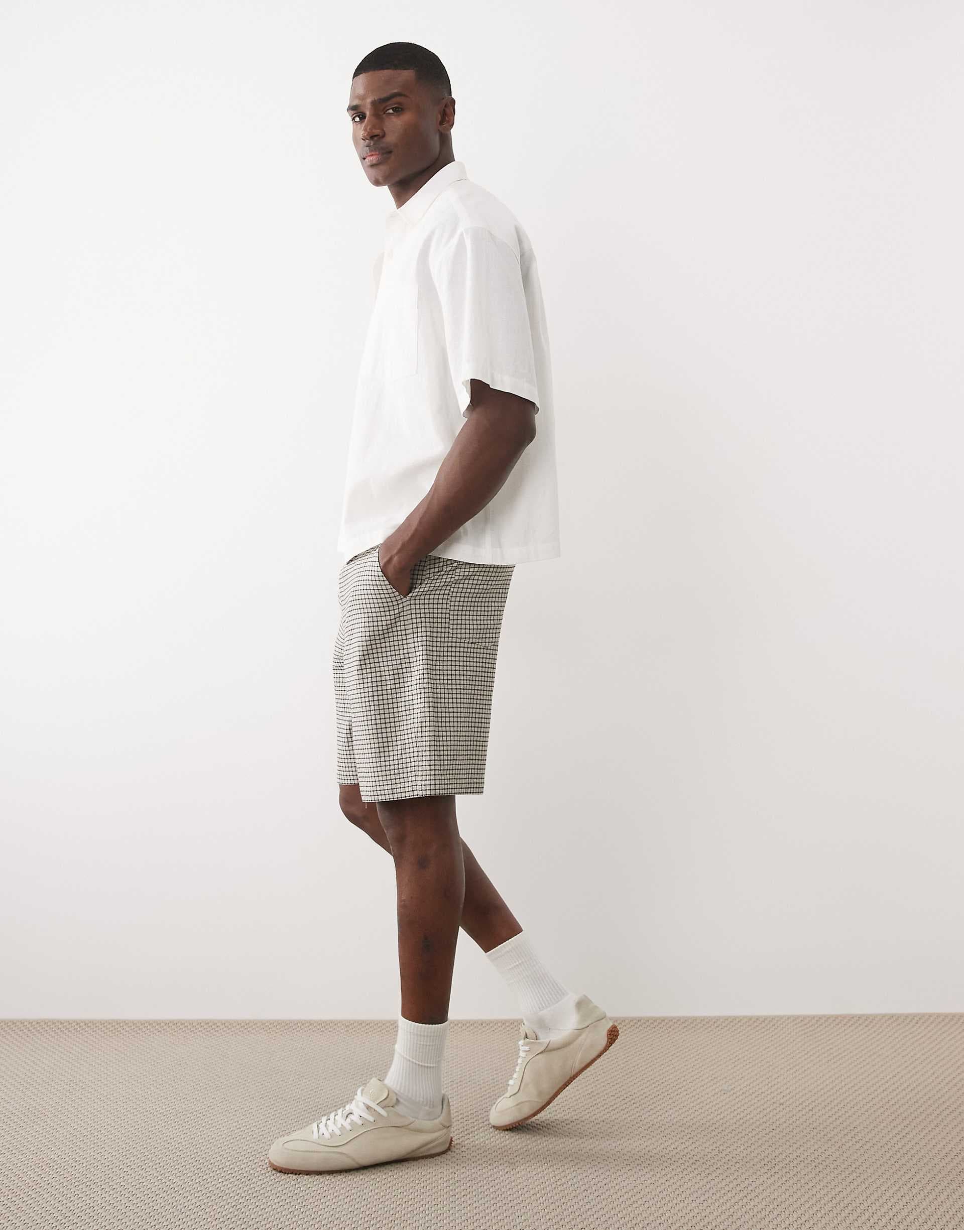 ASOS DESIGN mid length jorts with pleat & tie styling in plaid fabric
