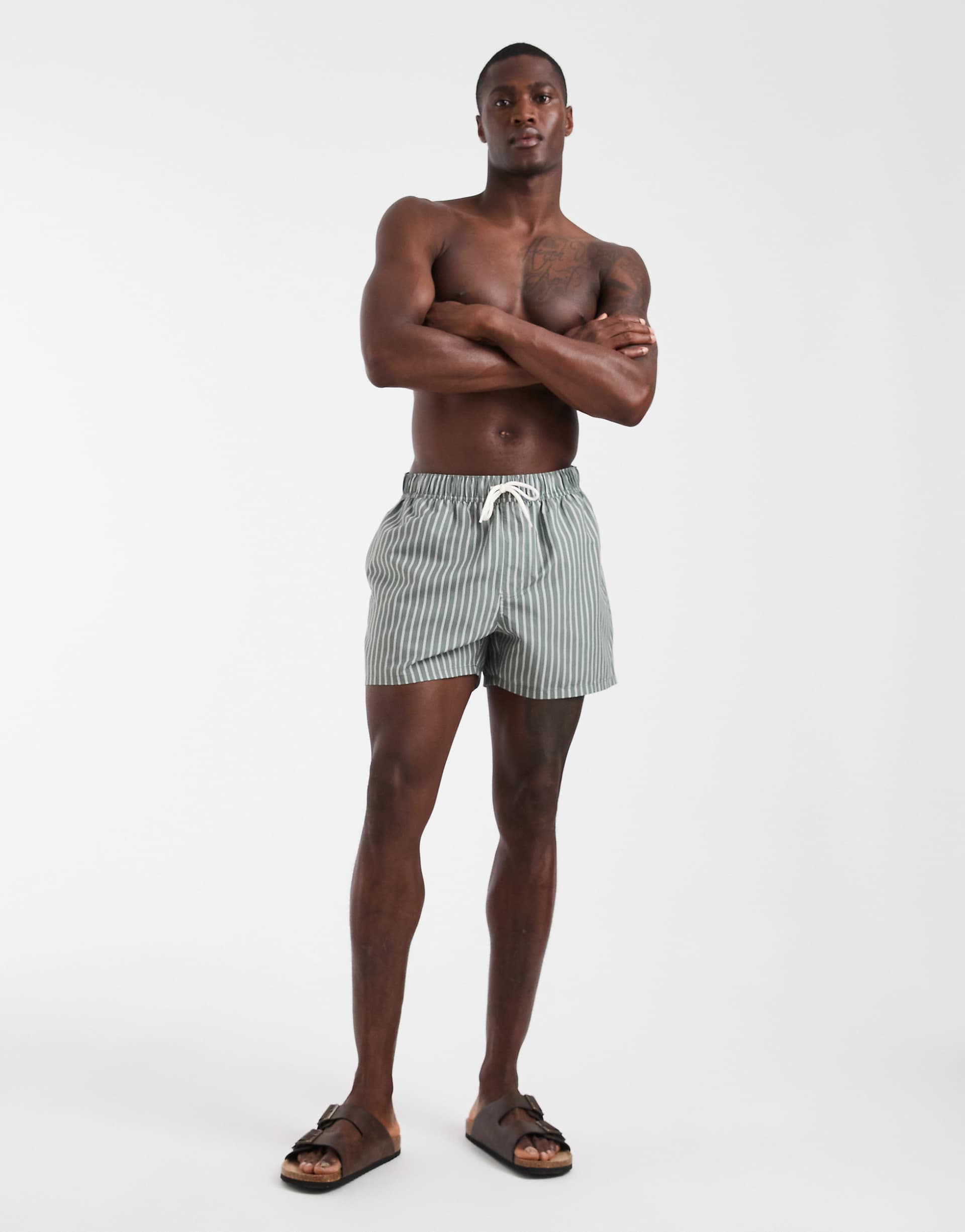 ASOS DESIGN swim shorts in short length in sage green stripes