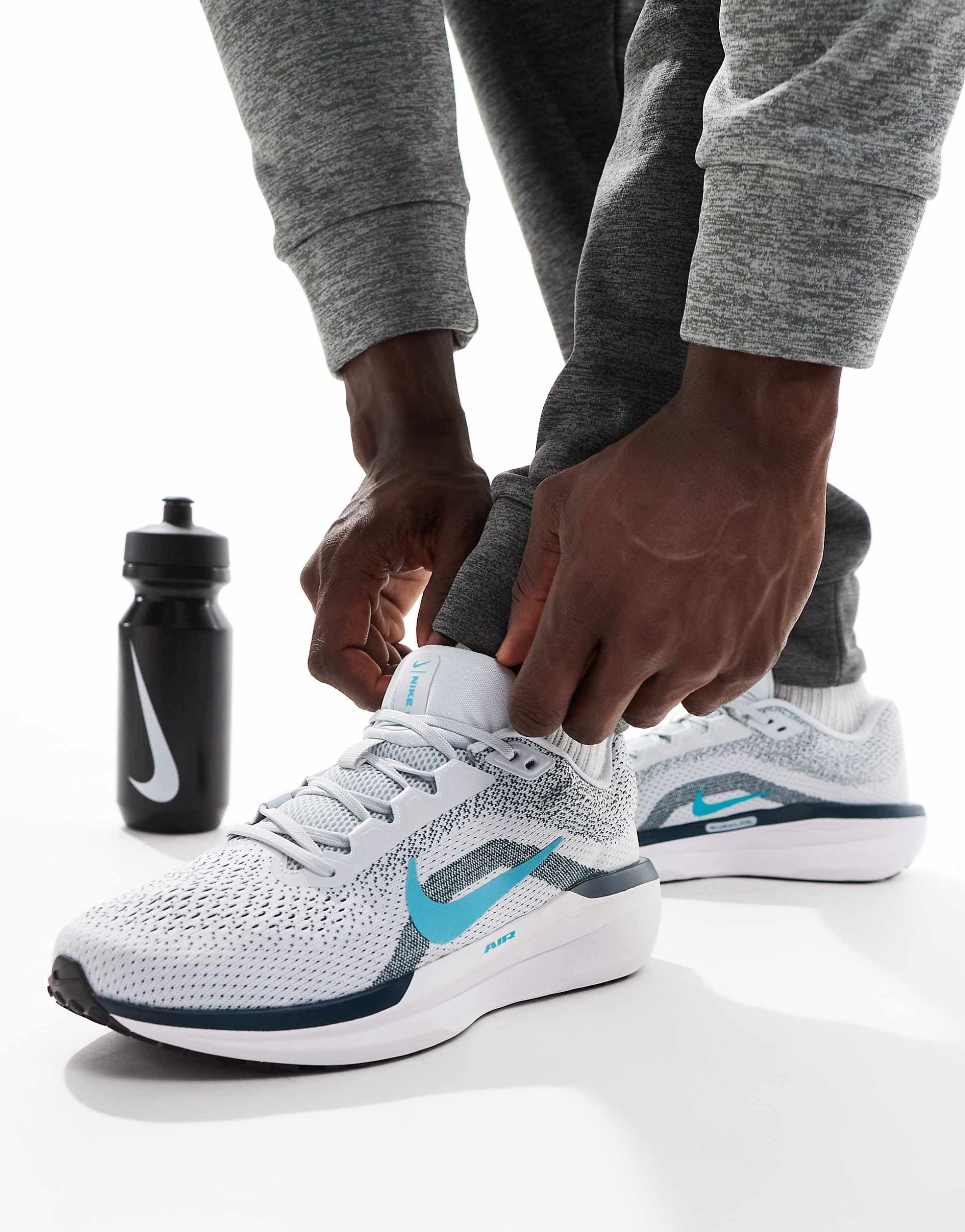 Nike Running Winflo 11 sneakers in white and blue