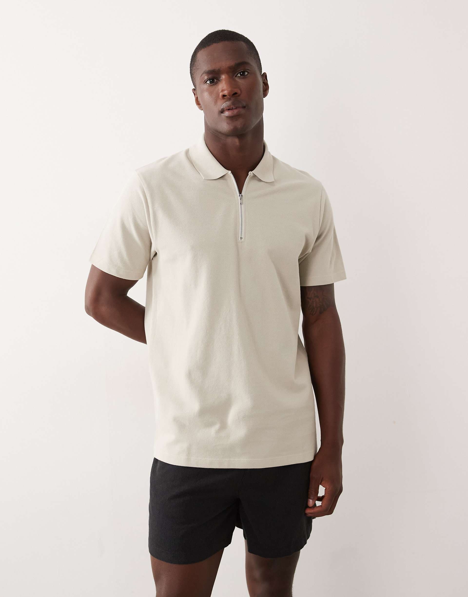 ASOS DESIGN regular fit polo with zip in beige pique
