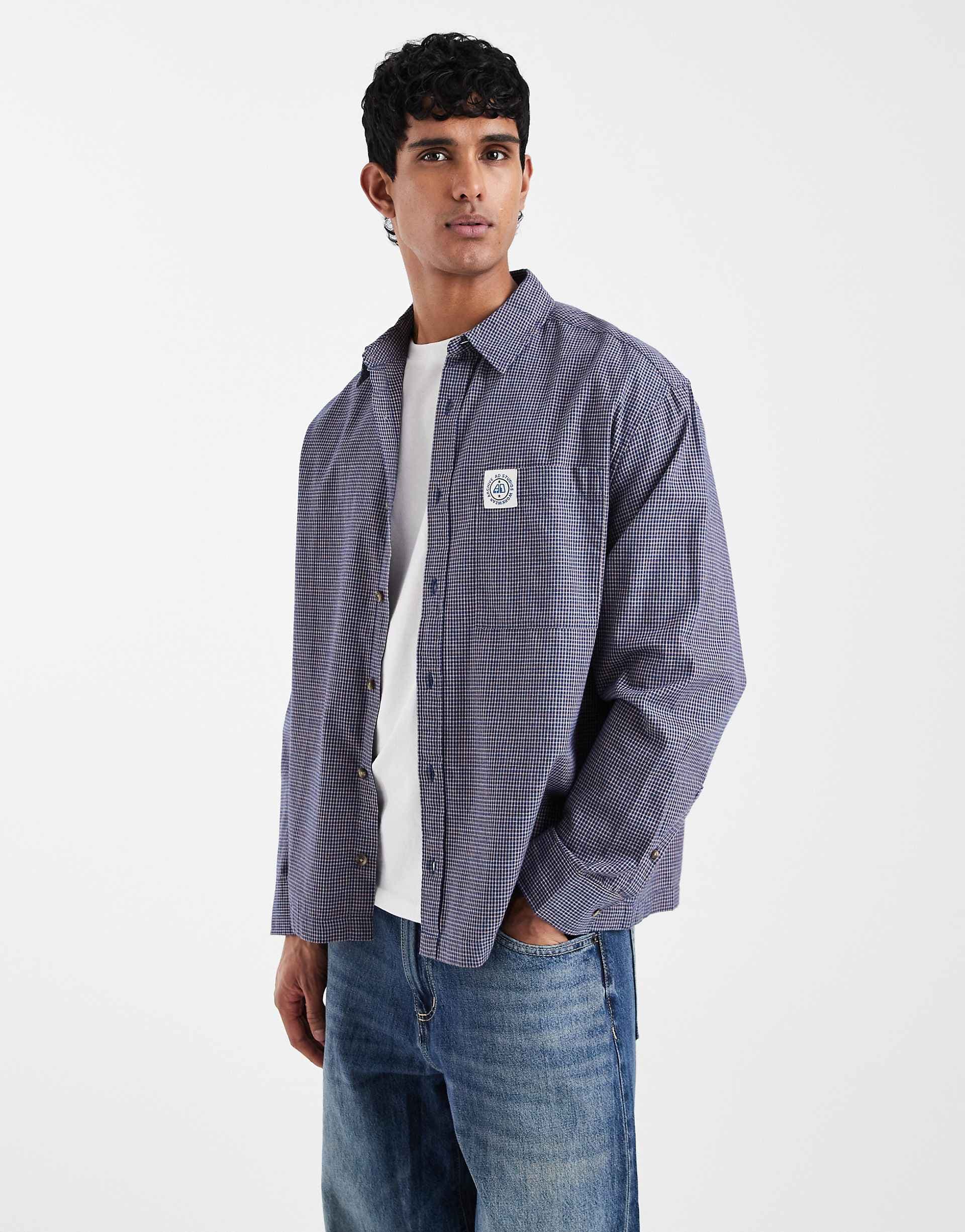 ASOS DESIGN oversized plaided shirt with chest badge in navy