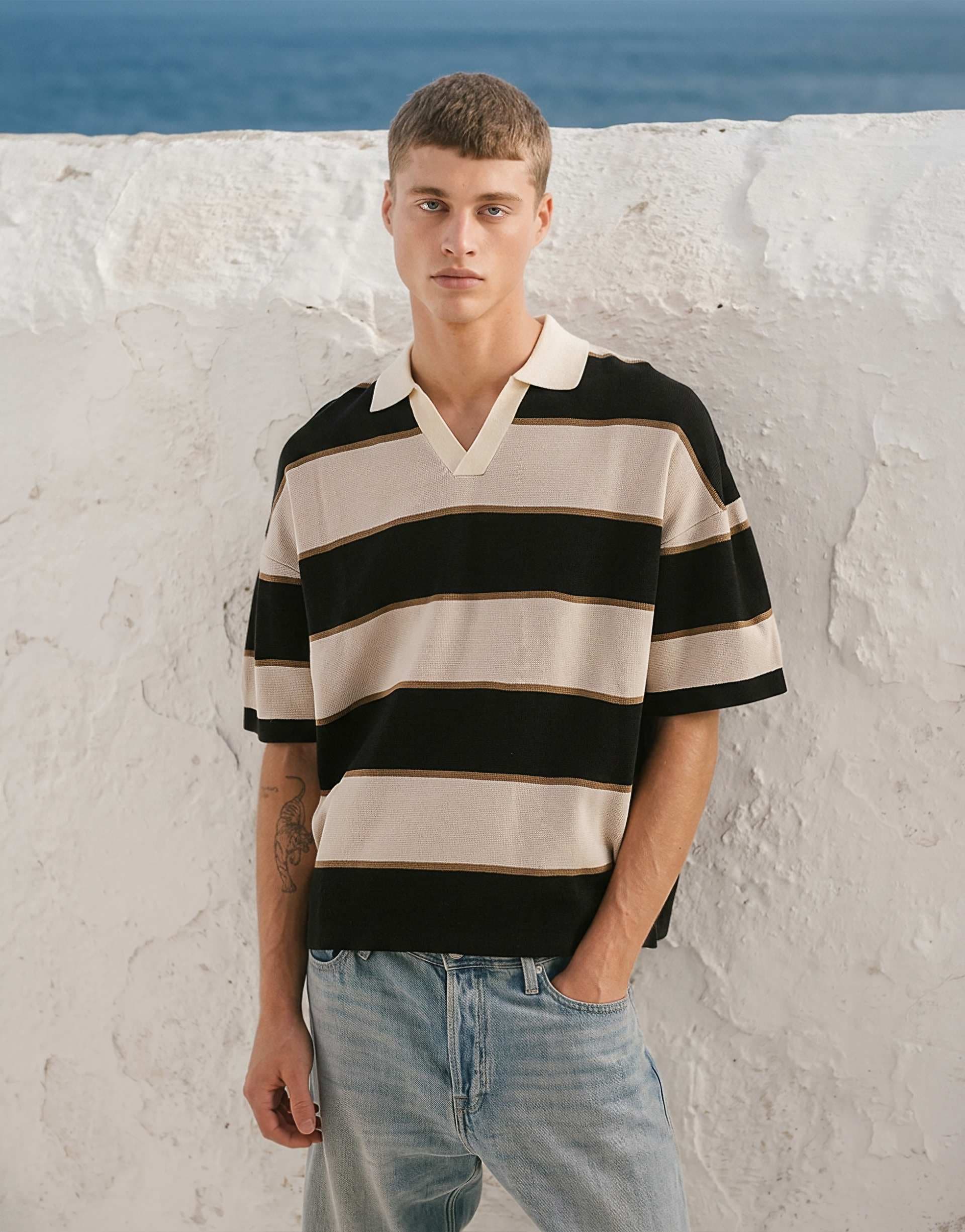ASOS DESIGN relaxed knit striped polo in black and stone