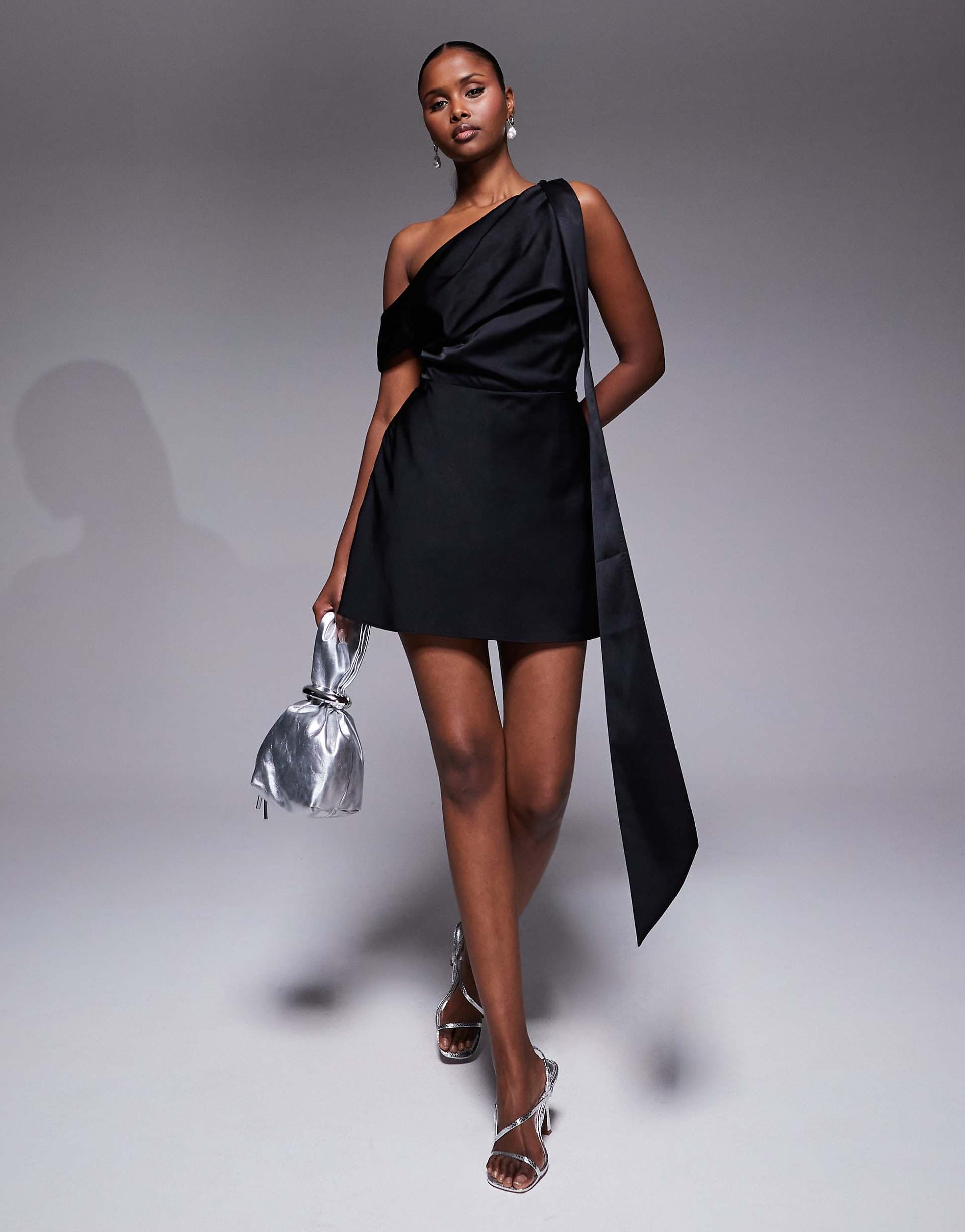 ASOS DESIGN satin scarf detail fallen shoulder romper in black