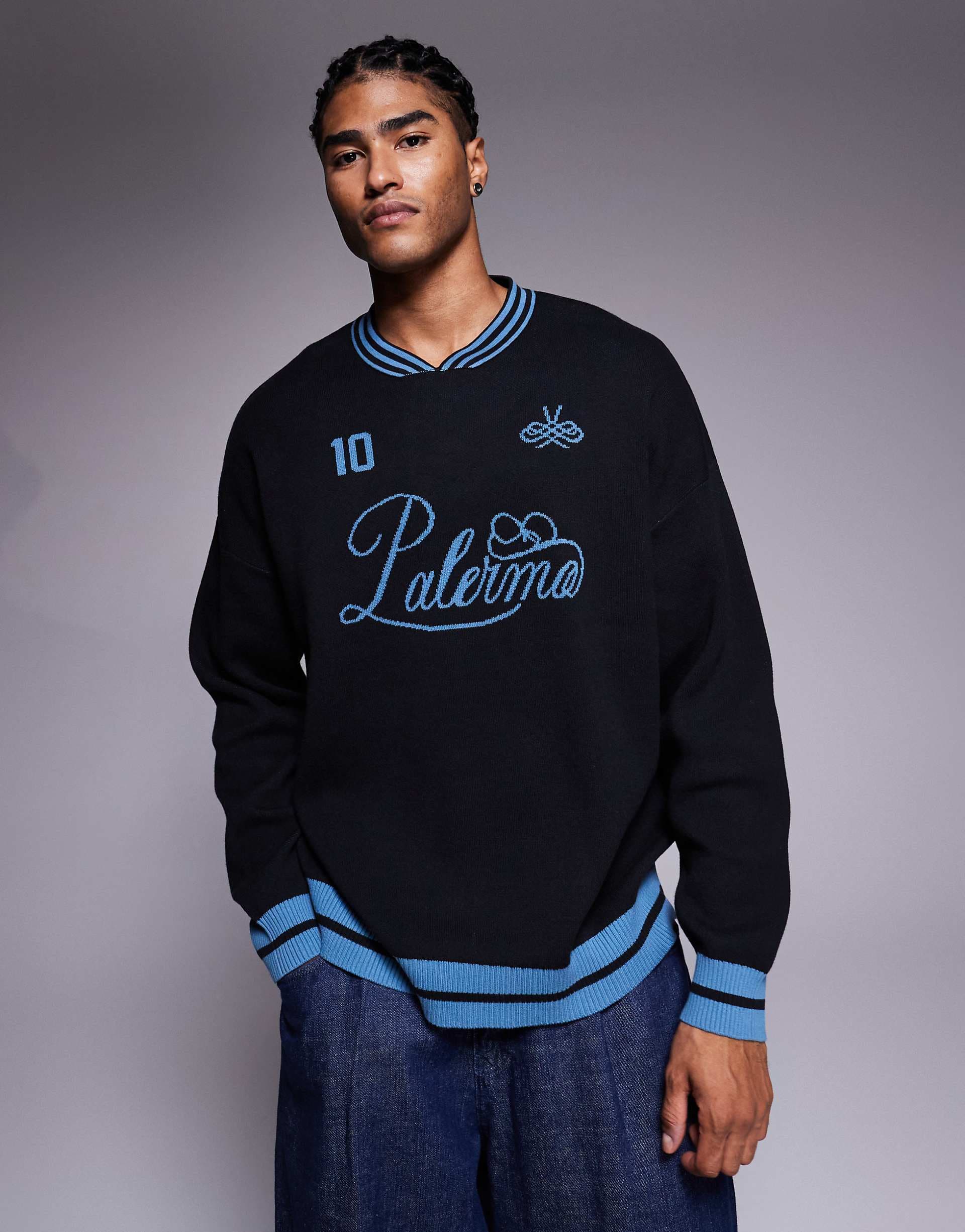 ASOS DESIGN oversized knit high v-neck sweater with Vadella sports print in black