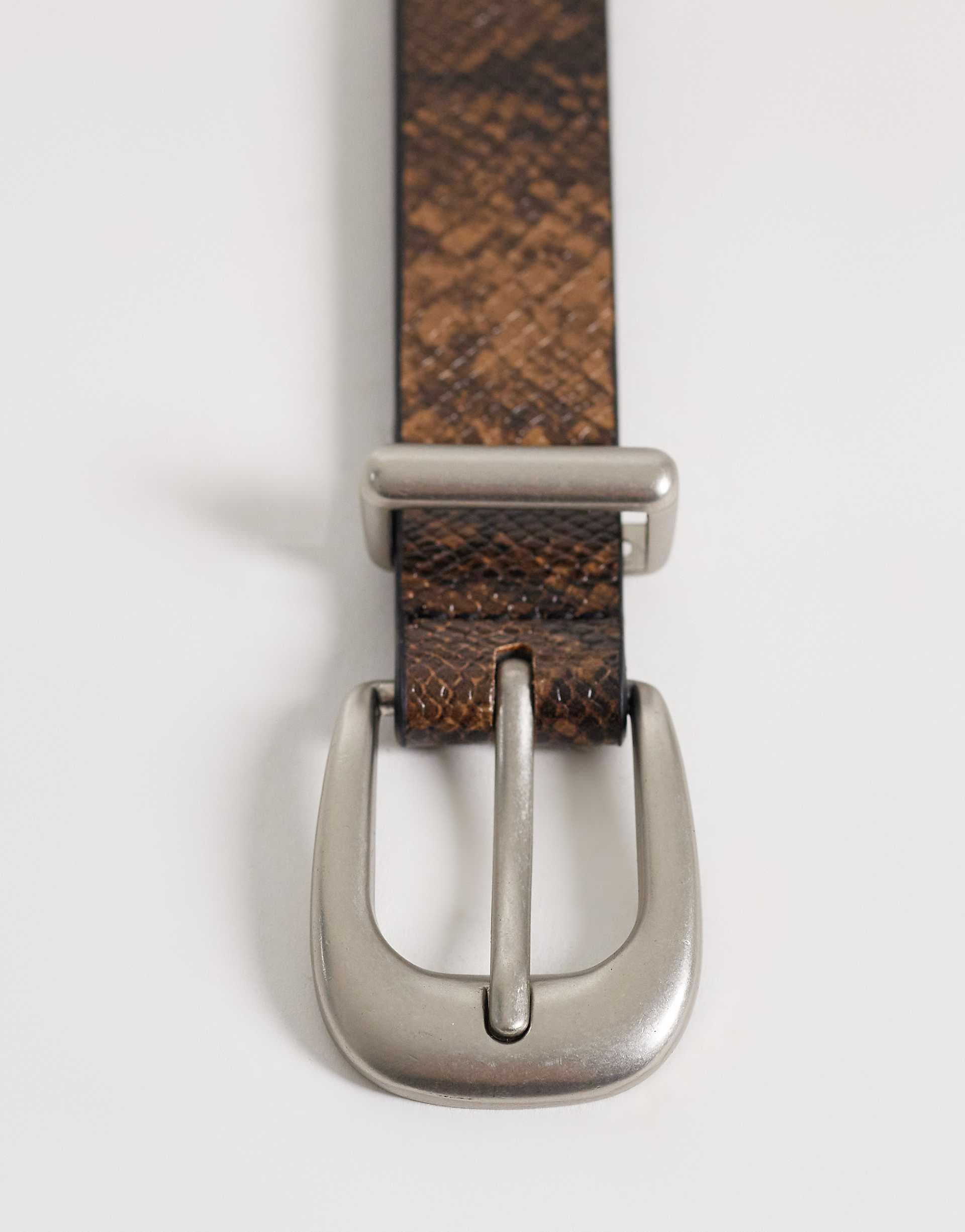 ASOS DESIGN faux leather snake print and texture belt with silver buckle in brown