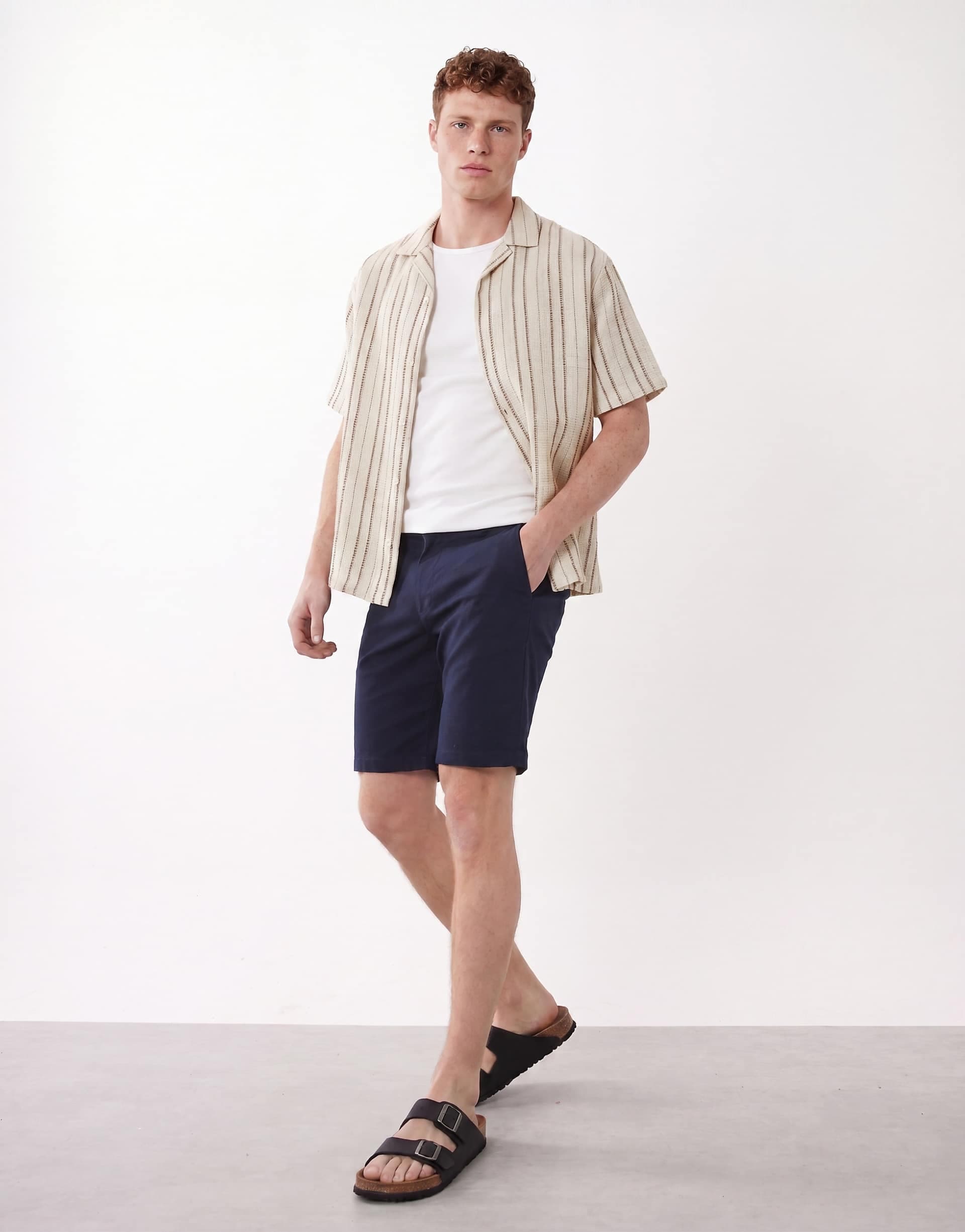 ASOS DESIGN skinny fit chino shorts in navy