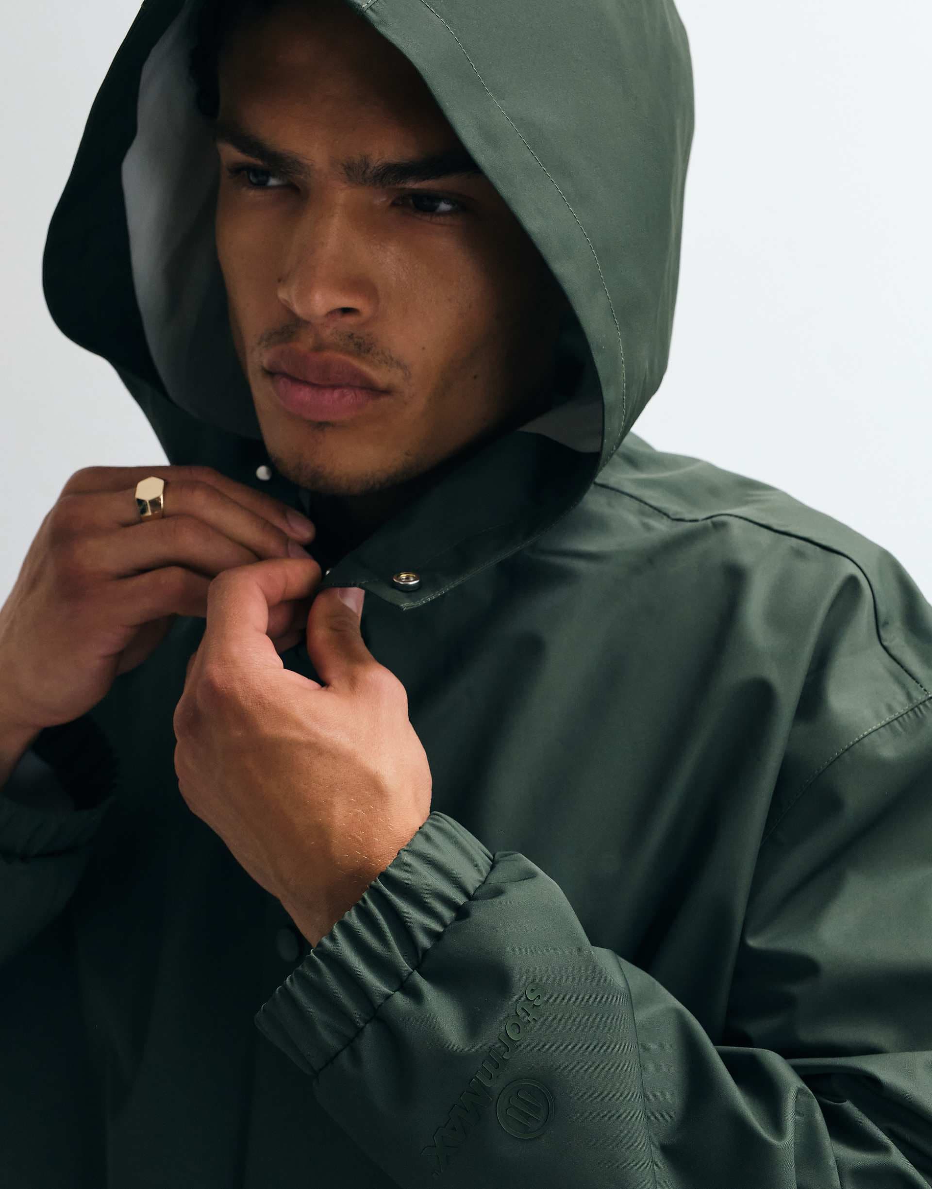 ASOS DESIGN stormMAX™ water repellent oversized raincoat in dark green