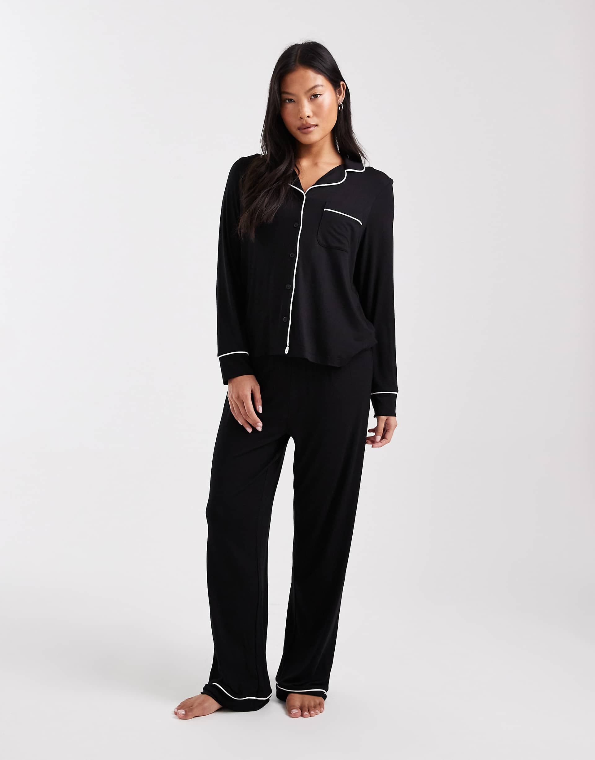 ASOS DESIGN Petite super soft long sleeve shirt & pants pajama set with contrast piping in black