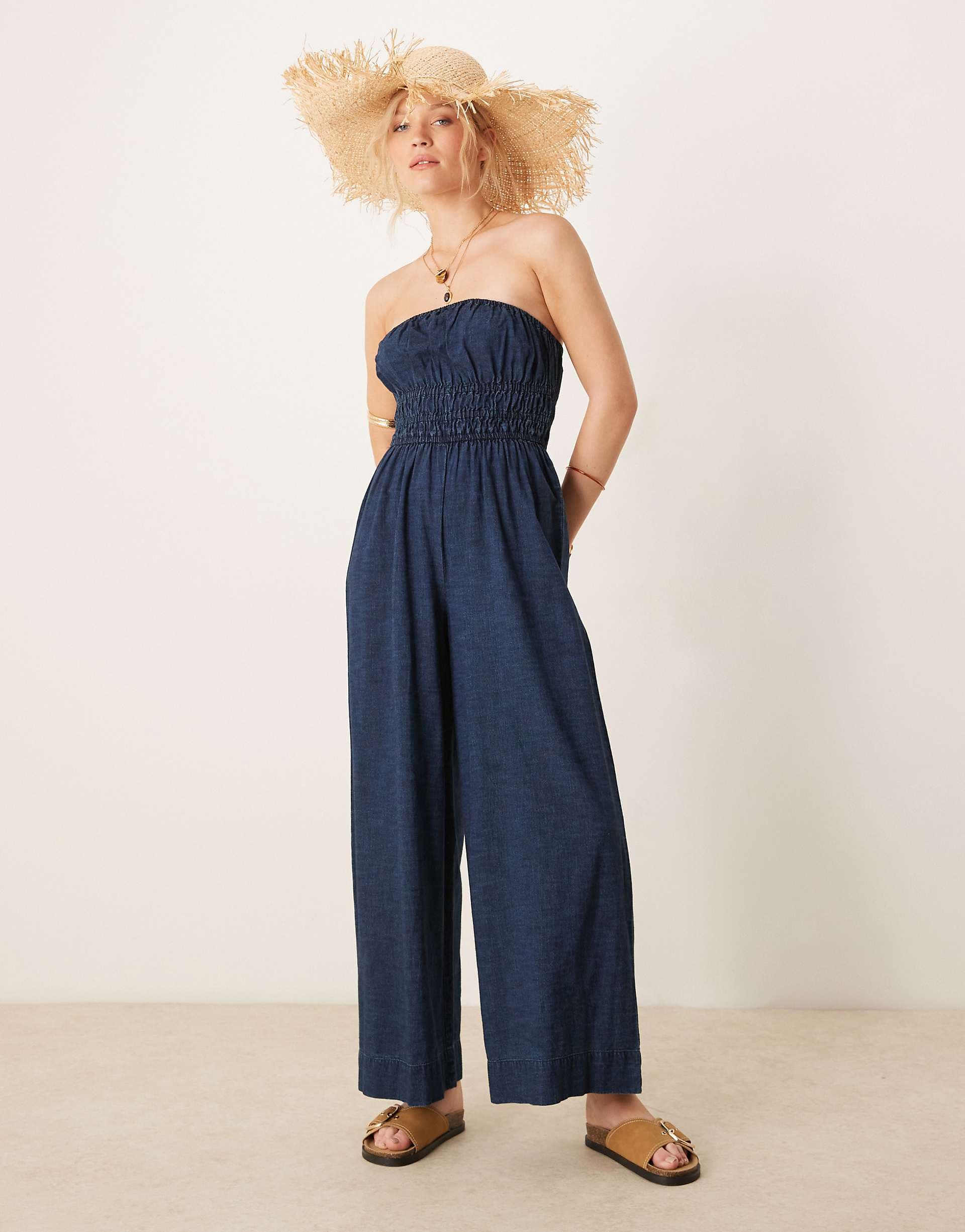 ASOS DESIGN soft denim strapless wide leg jumpsuit with shirring waist in rinse wash