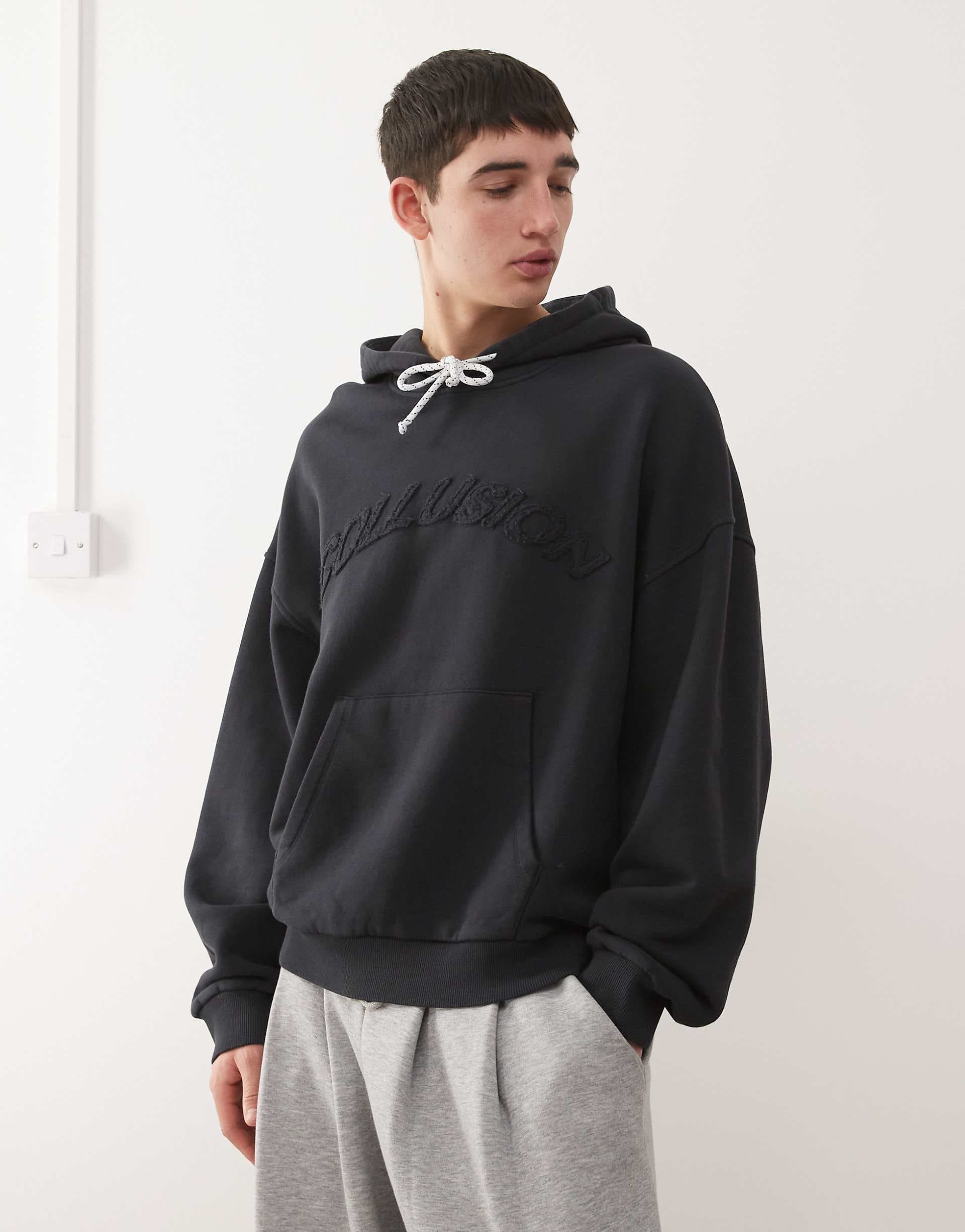 COLLUSION boxy hoodie with drawstring and appliqué logo