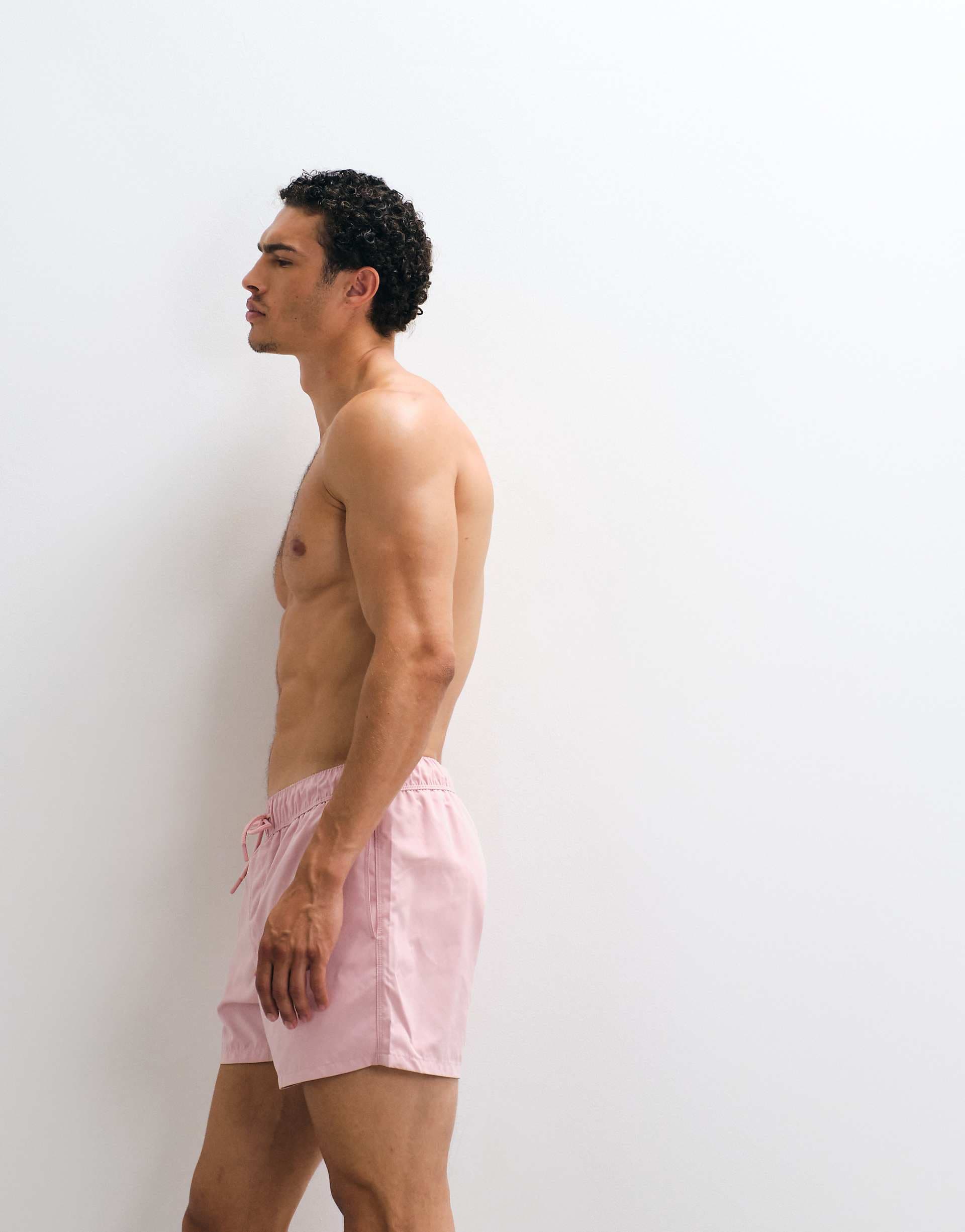 ASOS DESIGN swim shorts in short length in pink