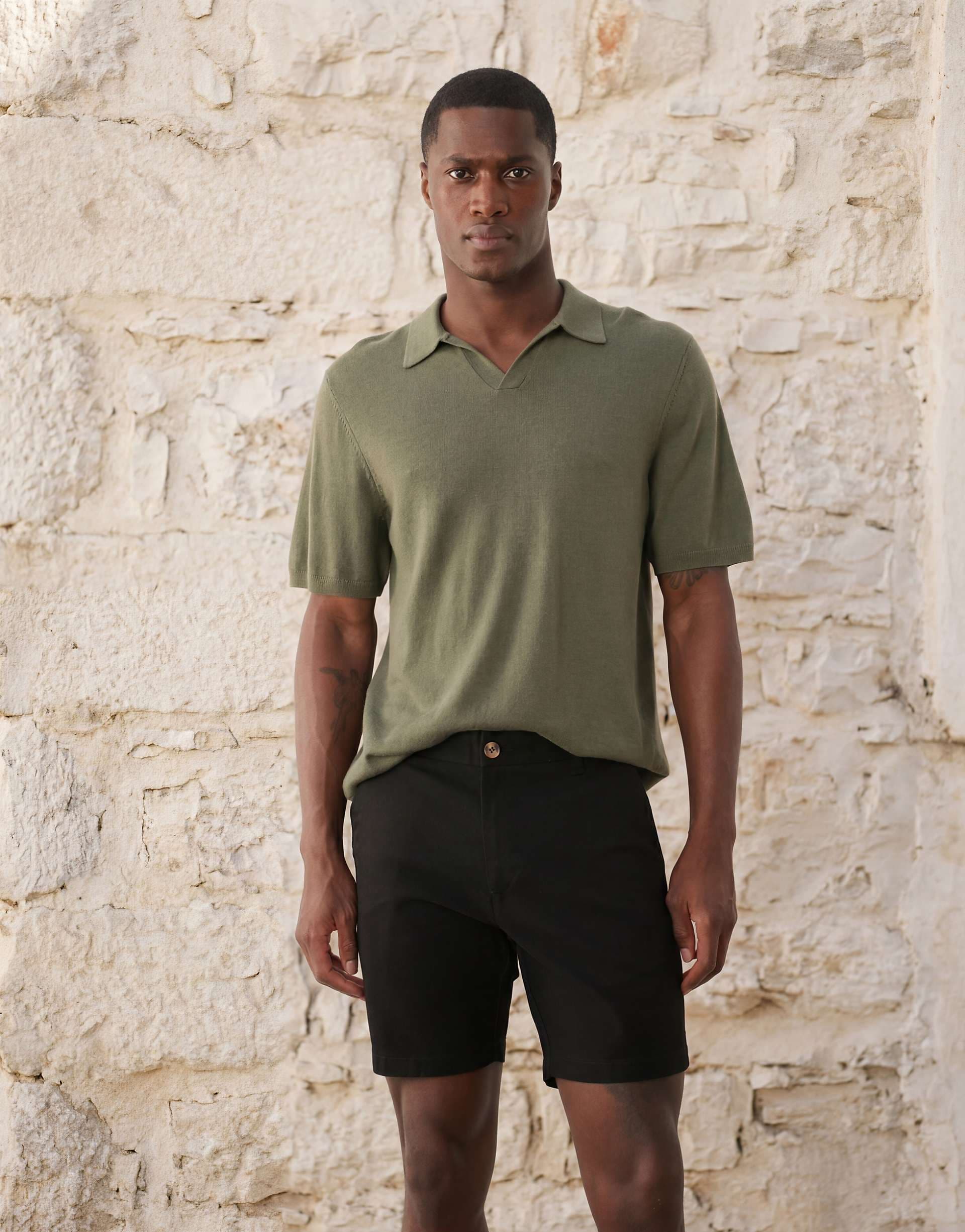 ASOS DESIGN skinny fit chino shorts in mid length in black