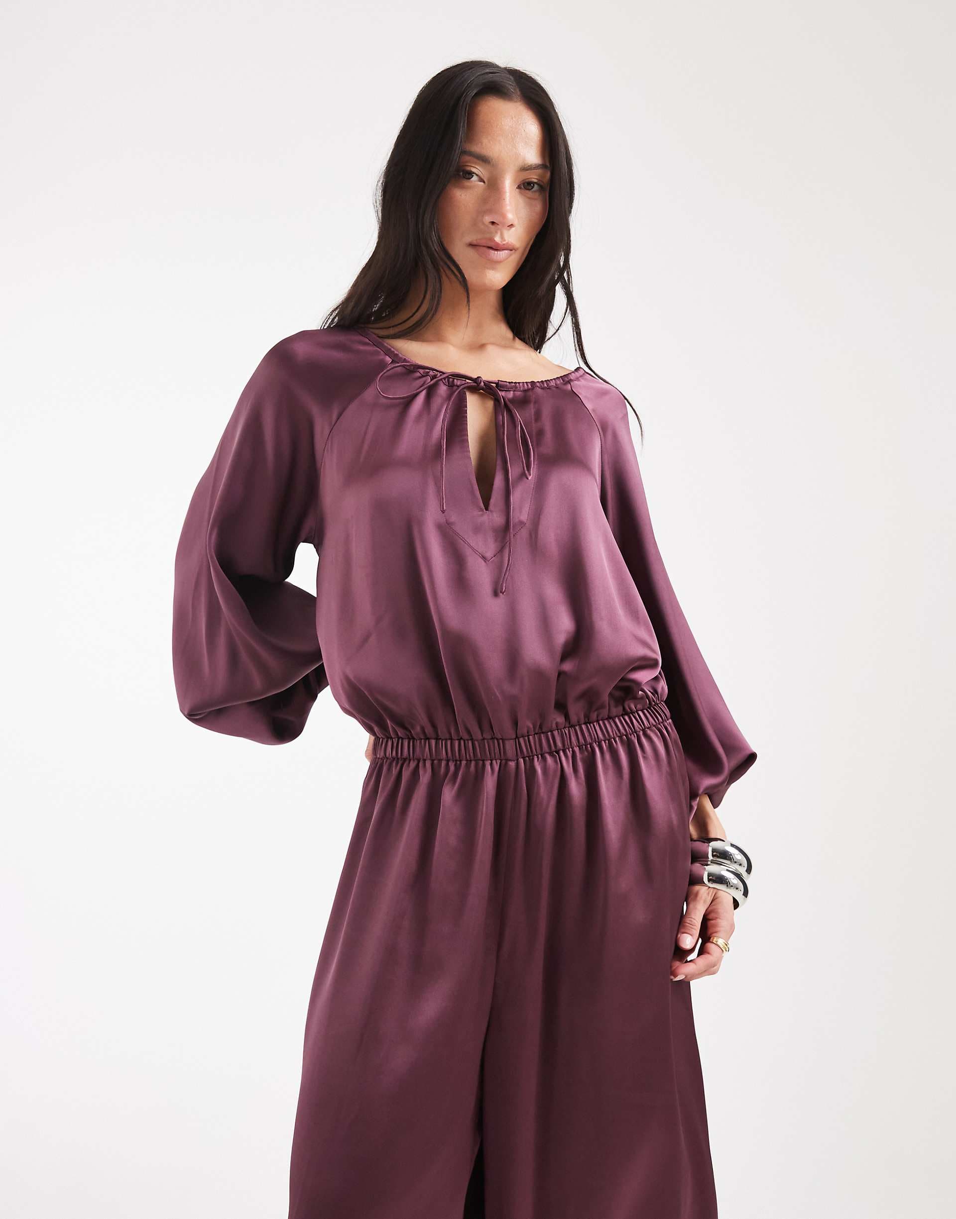 ASOS DESIGN long sleeve satin jumpsuit in burgundy