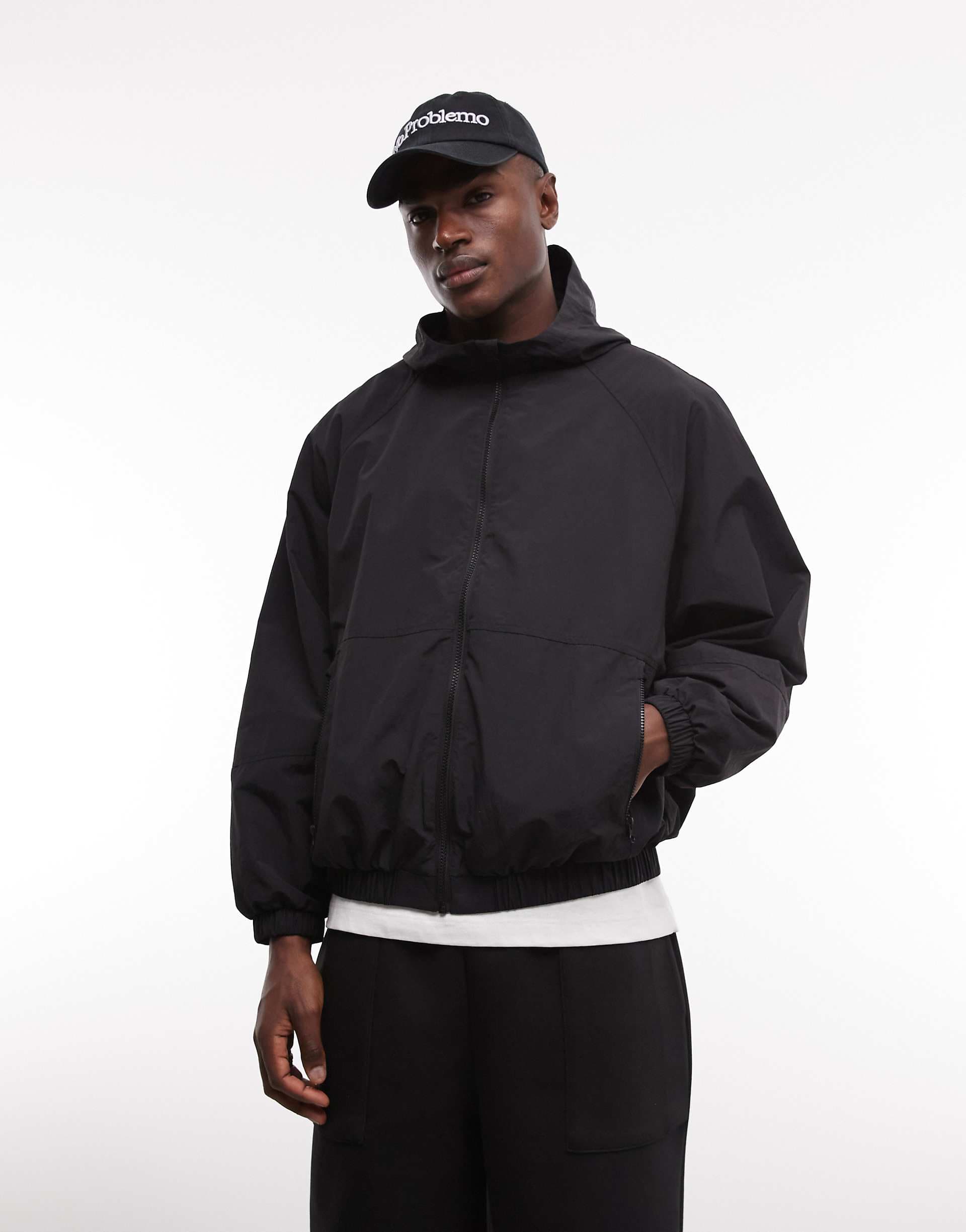 ASOS DESIGN stormMAX™ water repellent packaway rain jacket in black