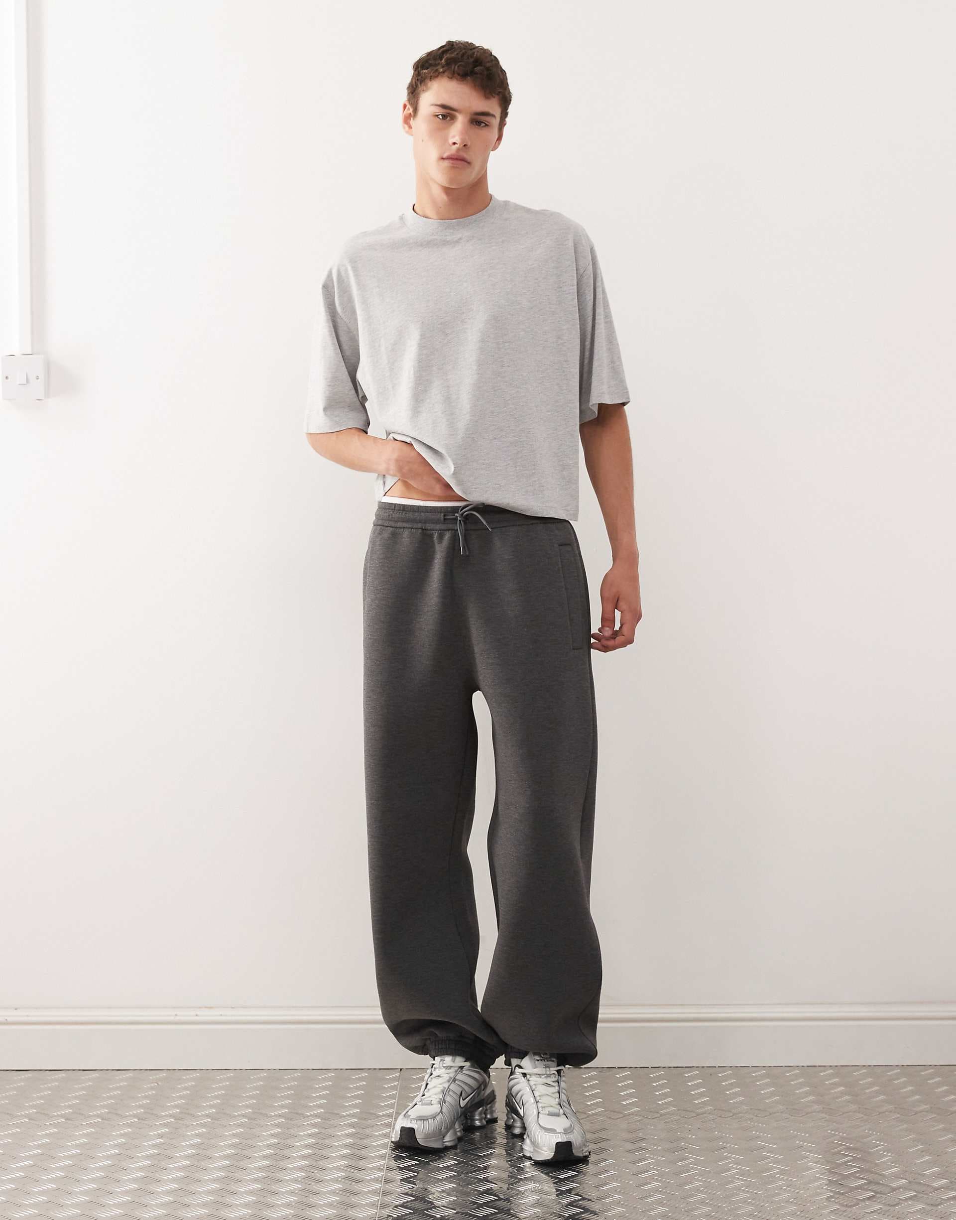 Weekday Simon sweatpants in dark heather gray scuba-style fabric