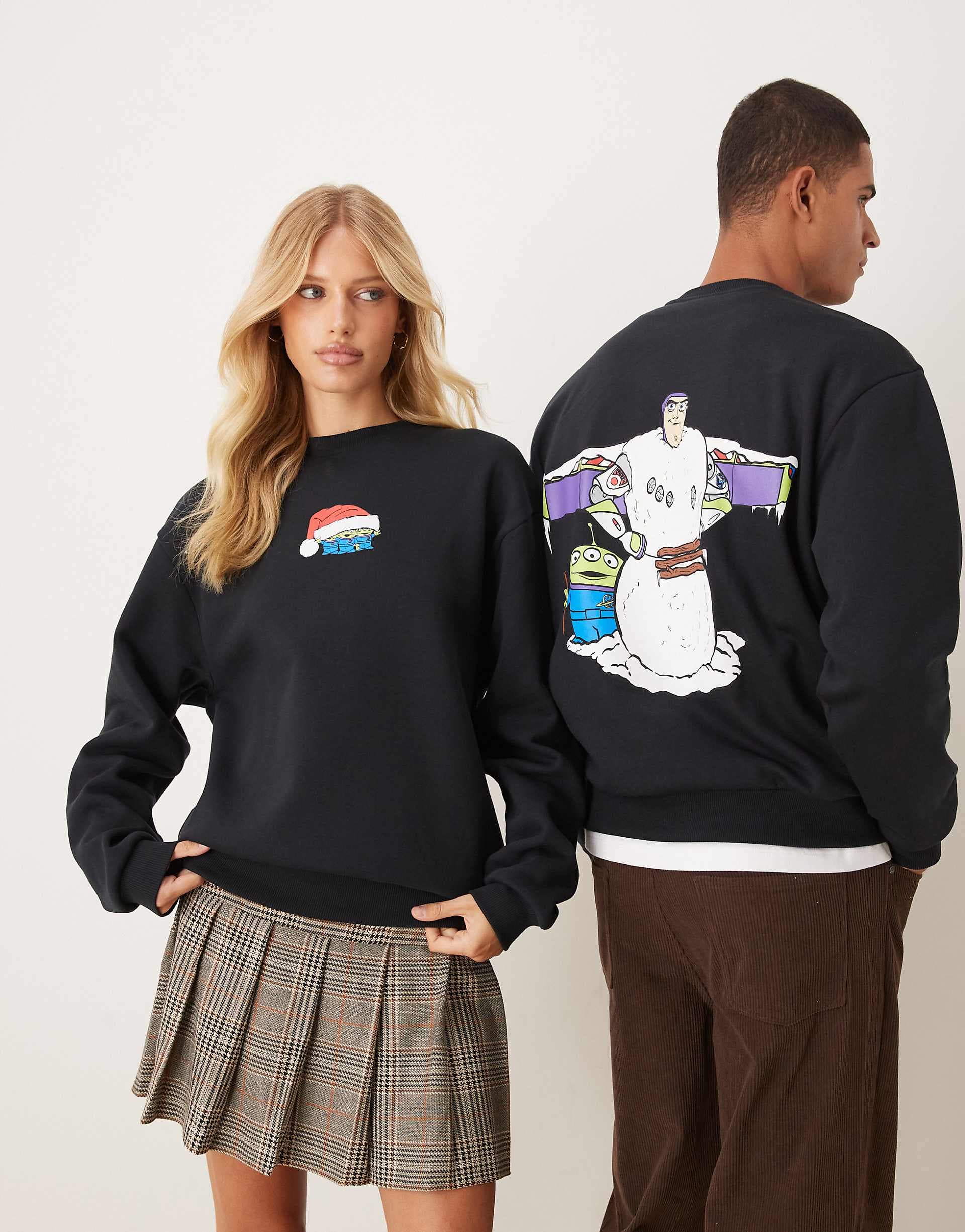 ASOS DESIGN Disney Pixar Christmas Relaxed unisex sweatshirt with Buzz Lightyear prints in deep navy