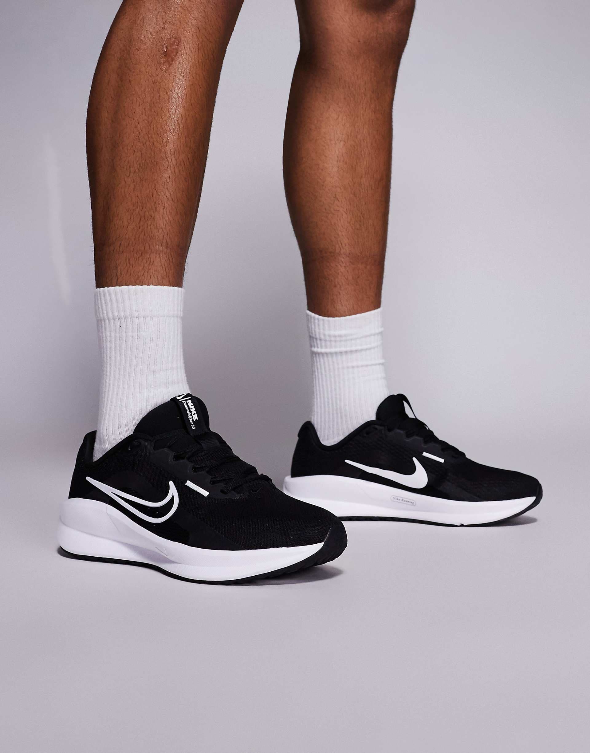 Nike Downshifter 13 running sneakers in black and white