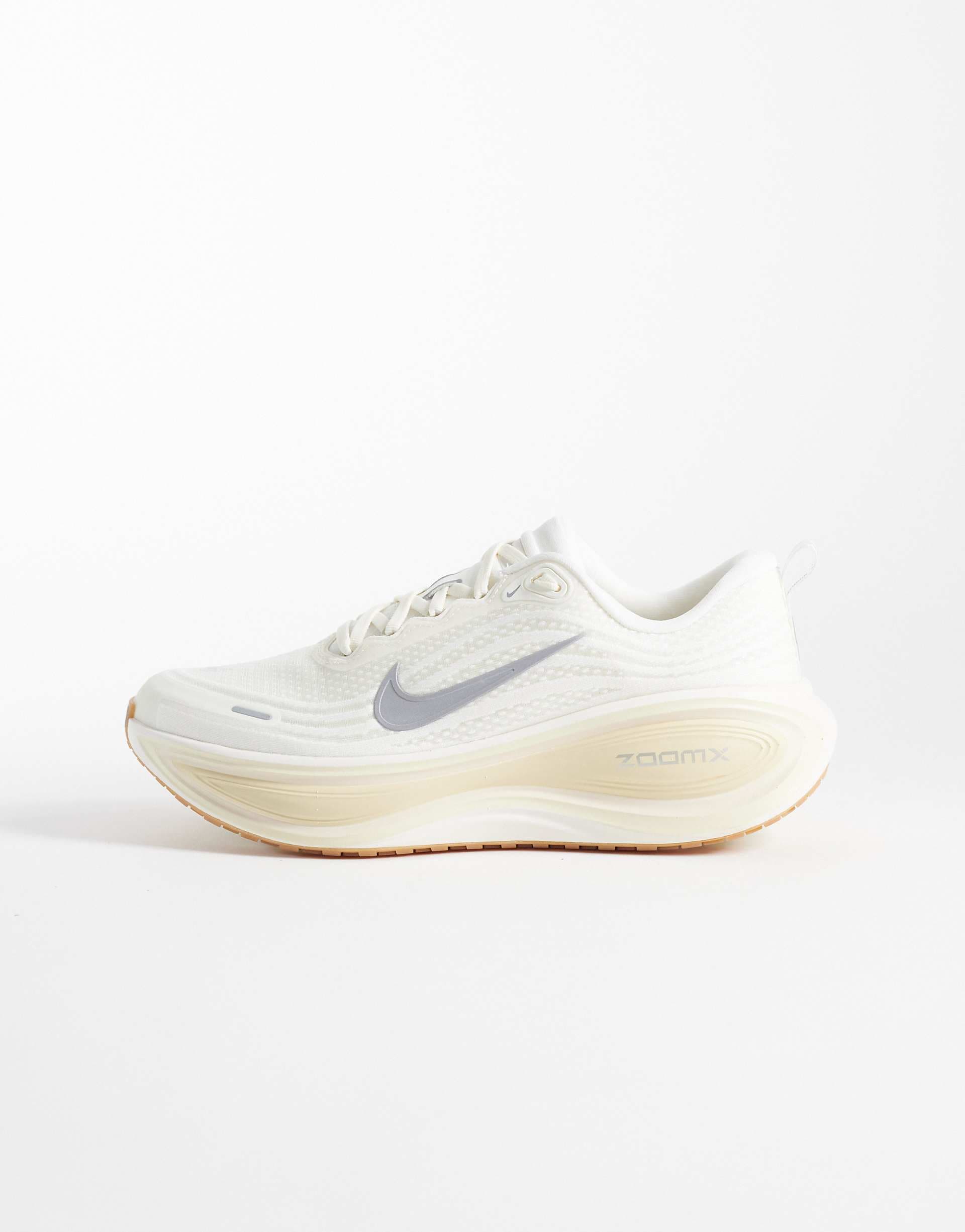 Nike Running Vomero Plus sneakers in off-white