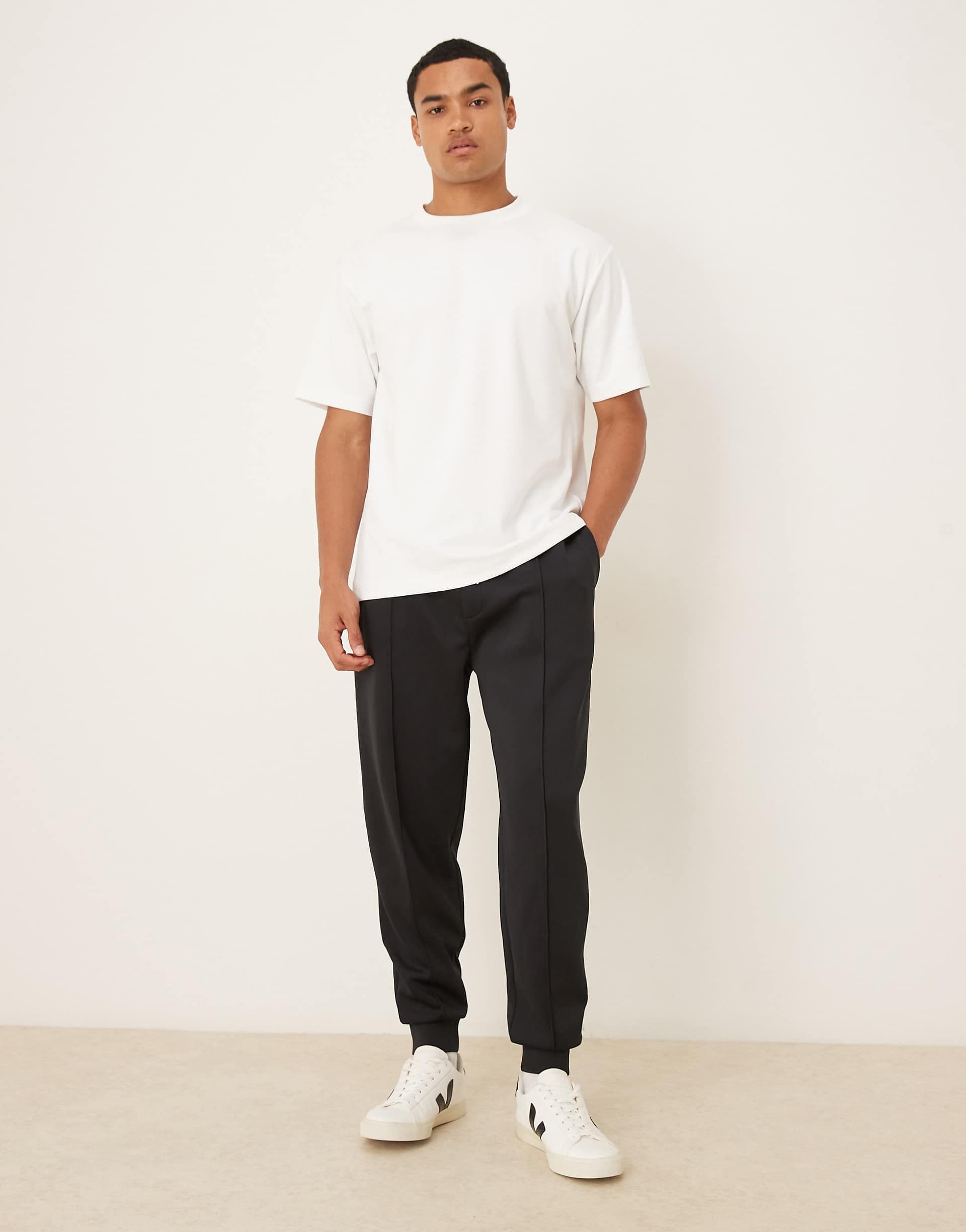 ASOS DESIGN heavyweight tapered sweatpants in scuba-style fabric in black