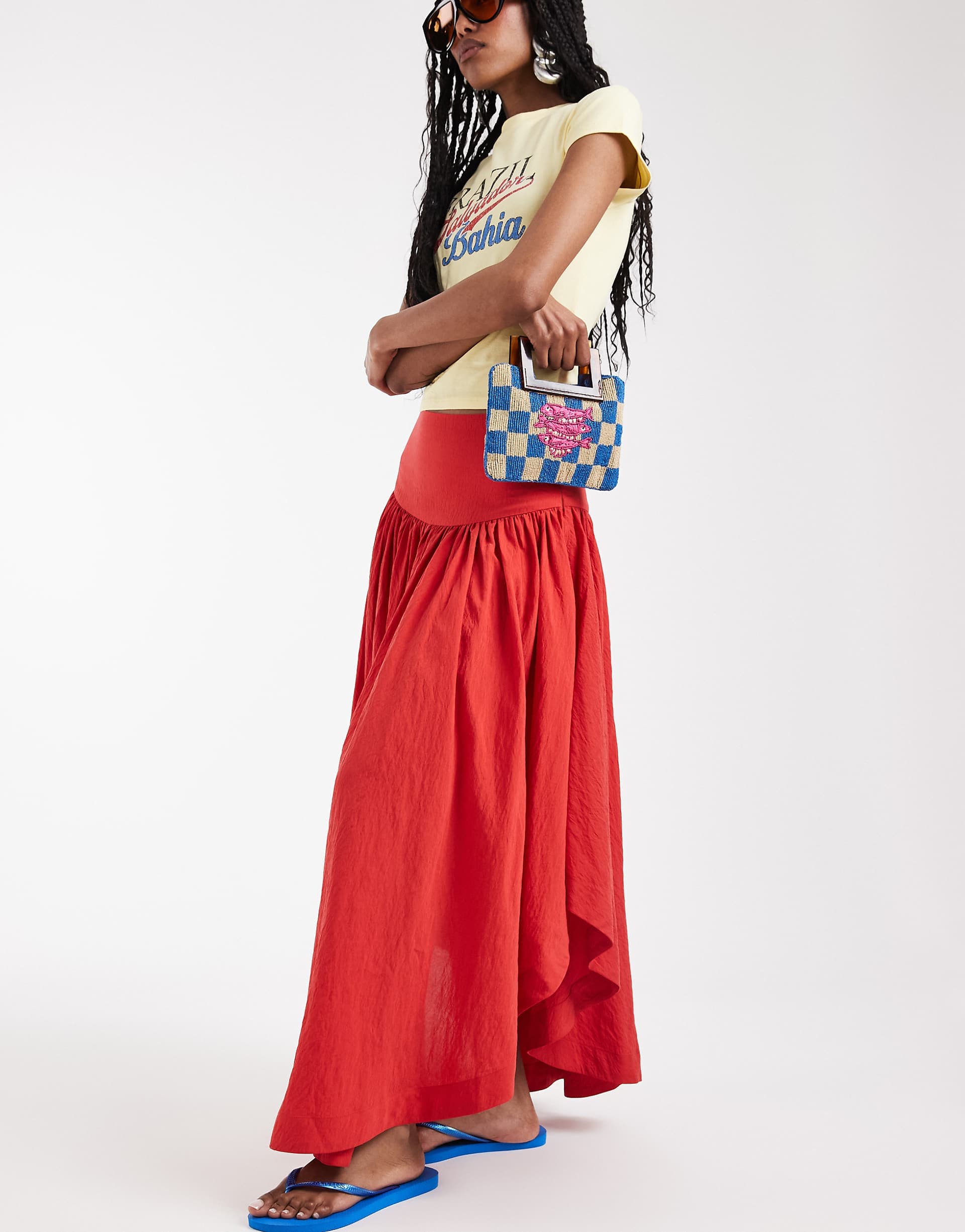 ASOS DESIGN dropped waist hitched asymmetric skirt in red