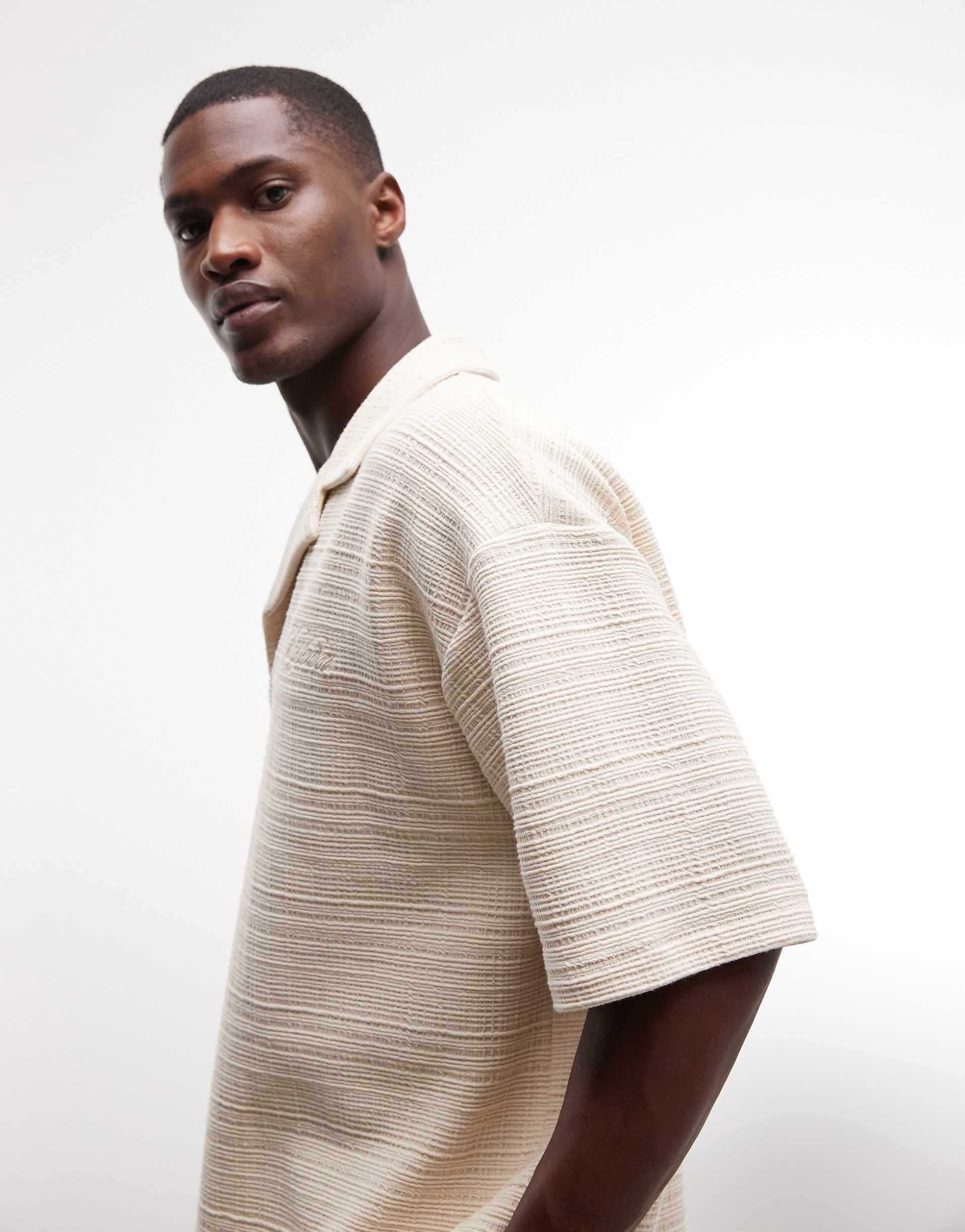 ASOS DESIGN heavyweight oversized polo shirt with satin chest embroidery in gray textured fabric - part of a set