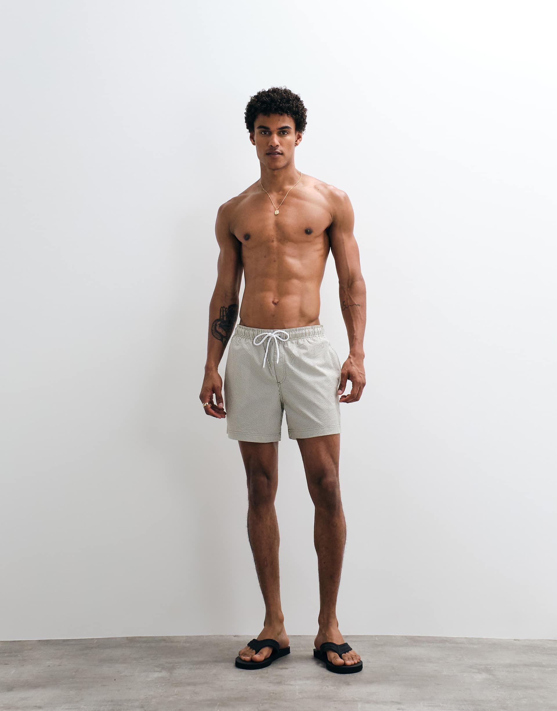 Jack & Jones seersucker striped swim shorts in khaki