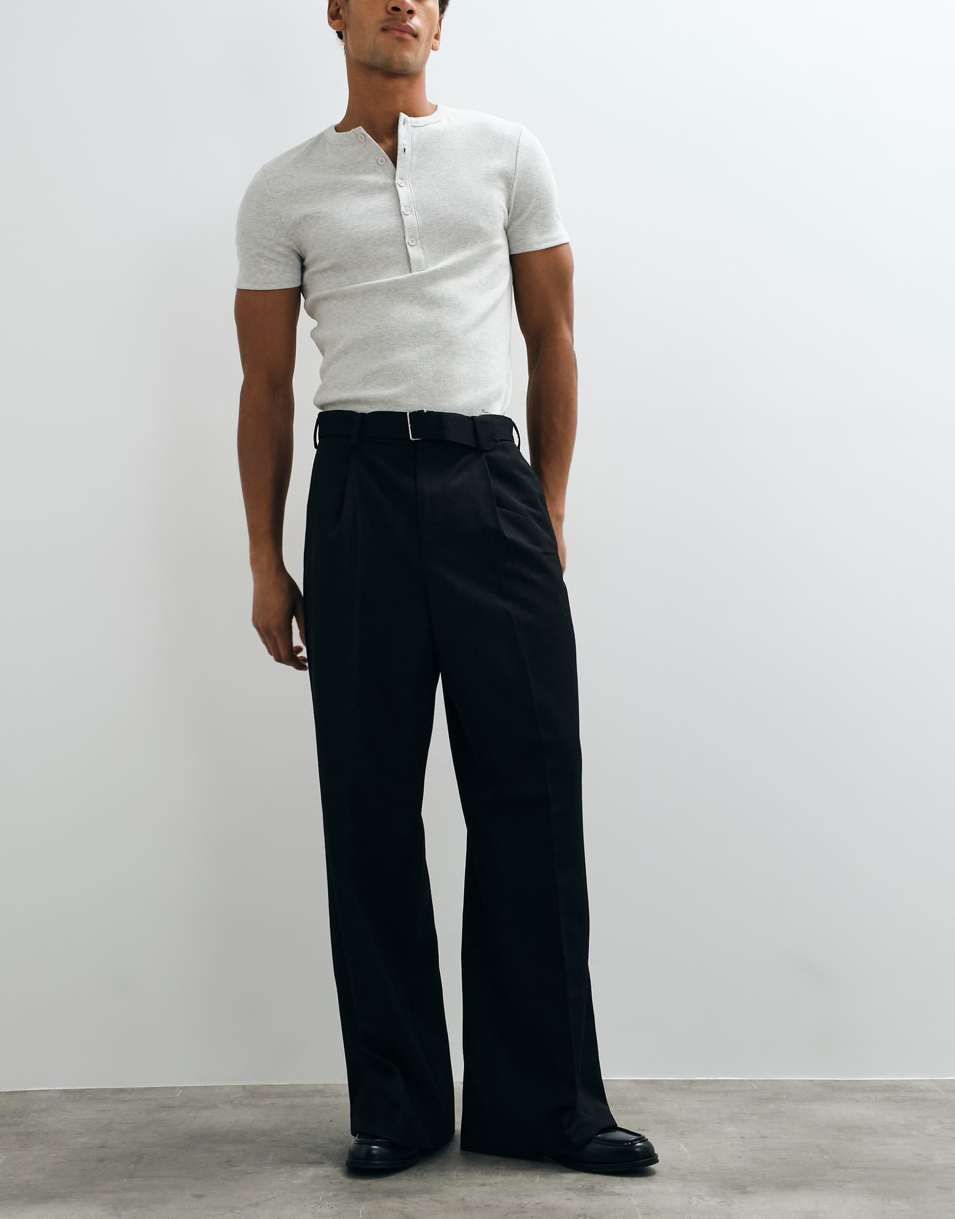 ASOS DESIGN tailored loose leg pants with buckle belt in black
