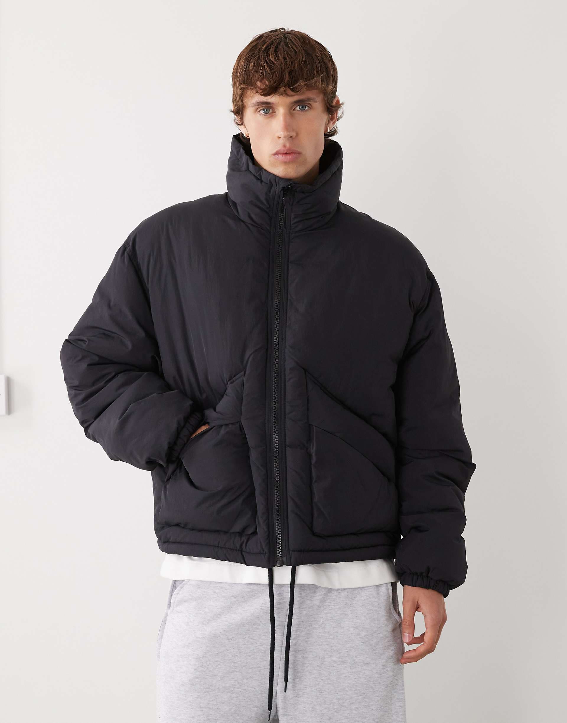 Weekday high neck puffer jacket in black