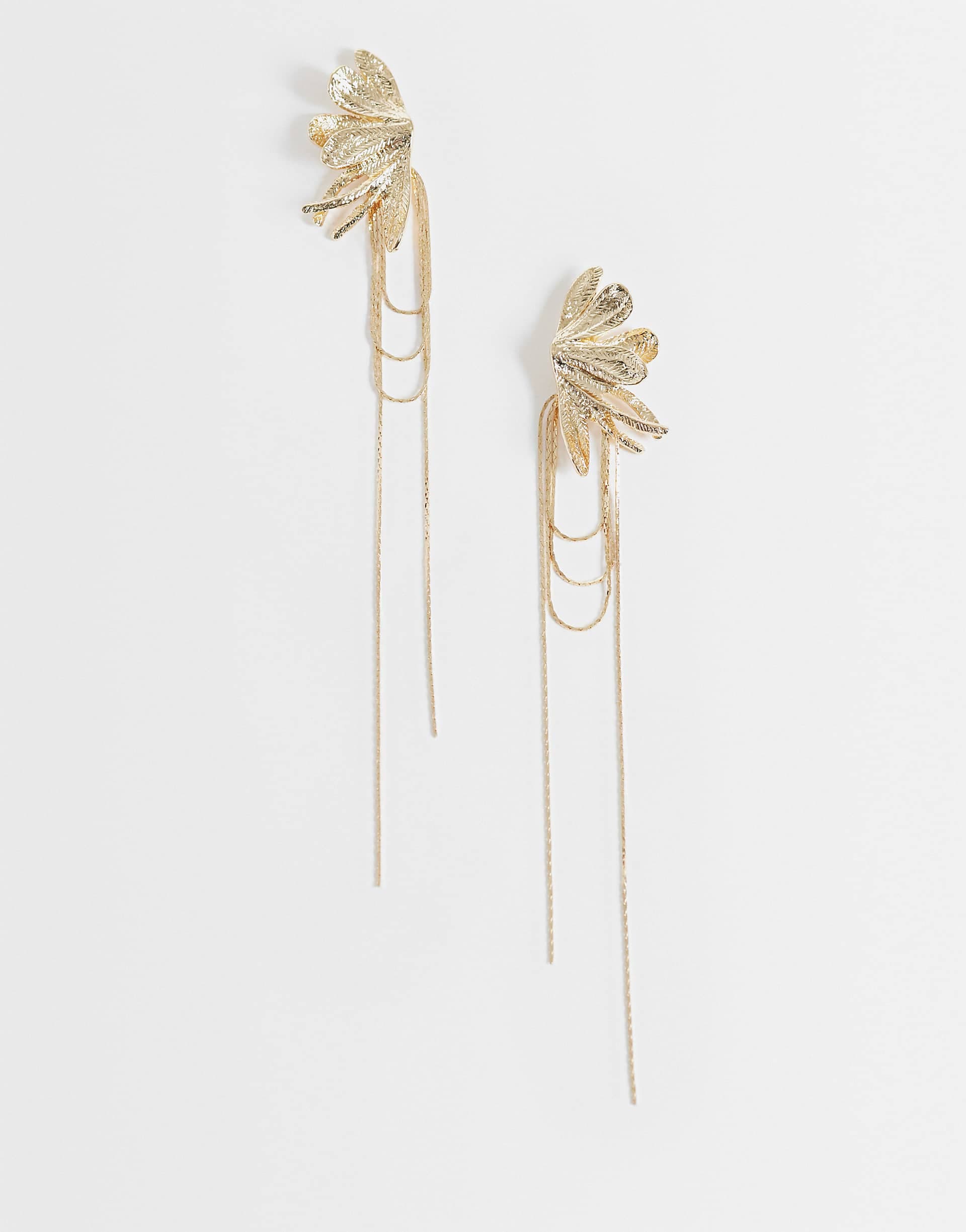 ASOS DESIGN half flower earrings with chain drop details in gold tone