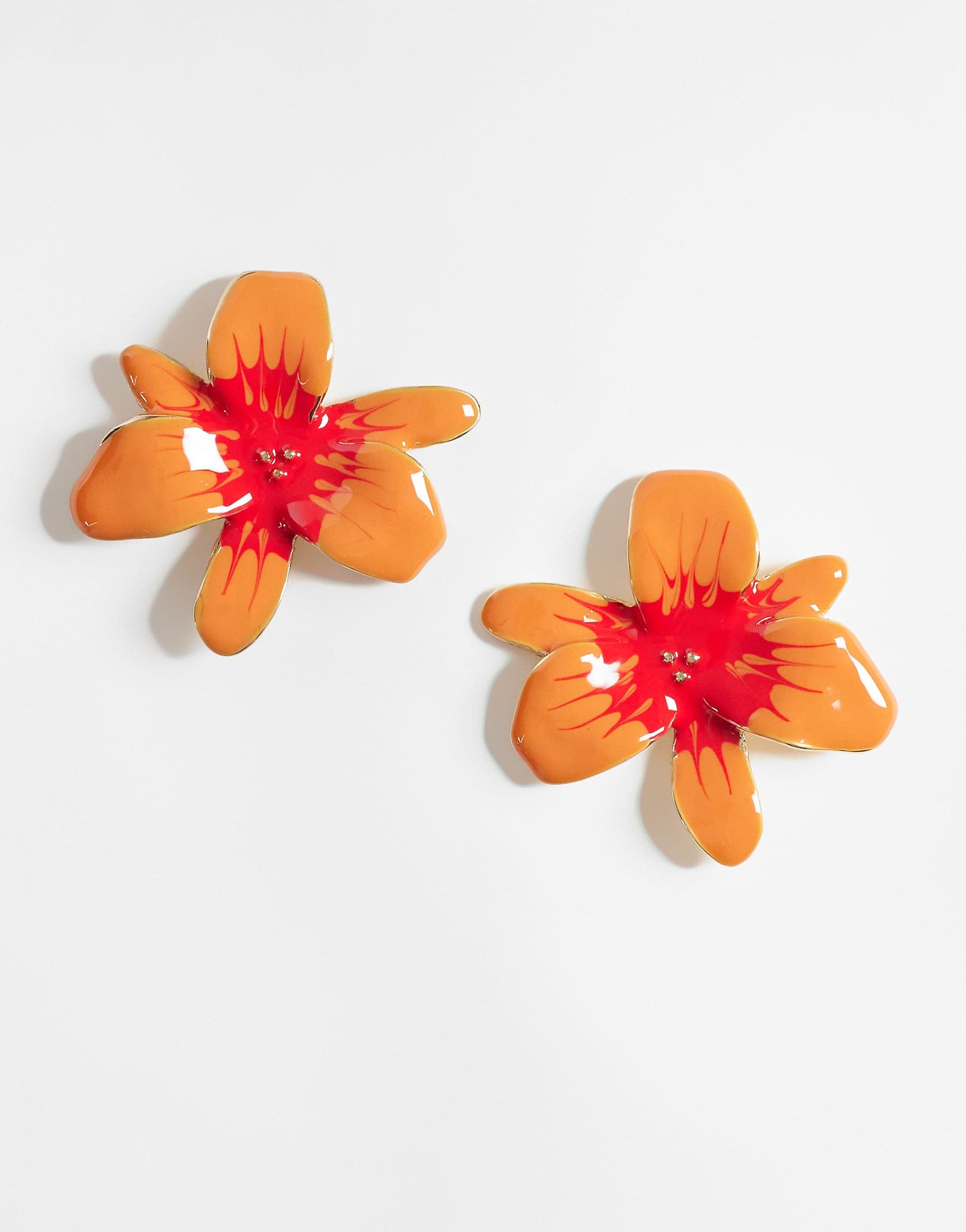 ASOS DESIGN stud earrings with flower design in bright orange
