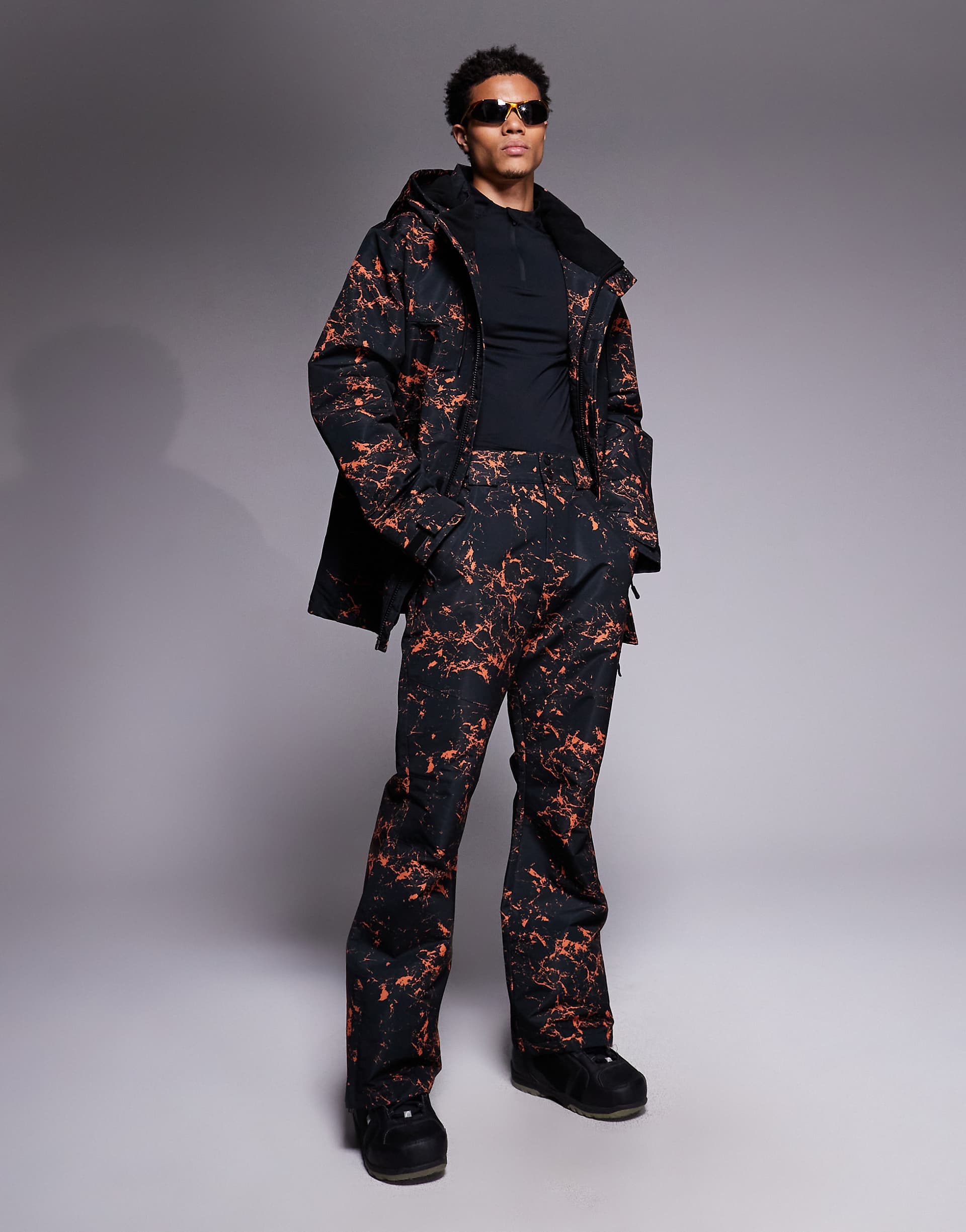 Threadbare ski pants in black and orange print