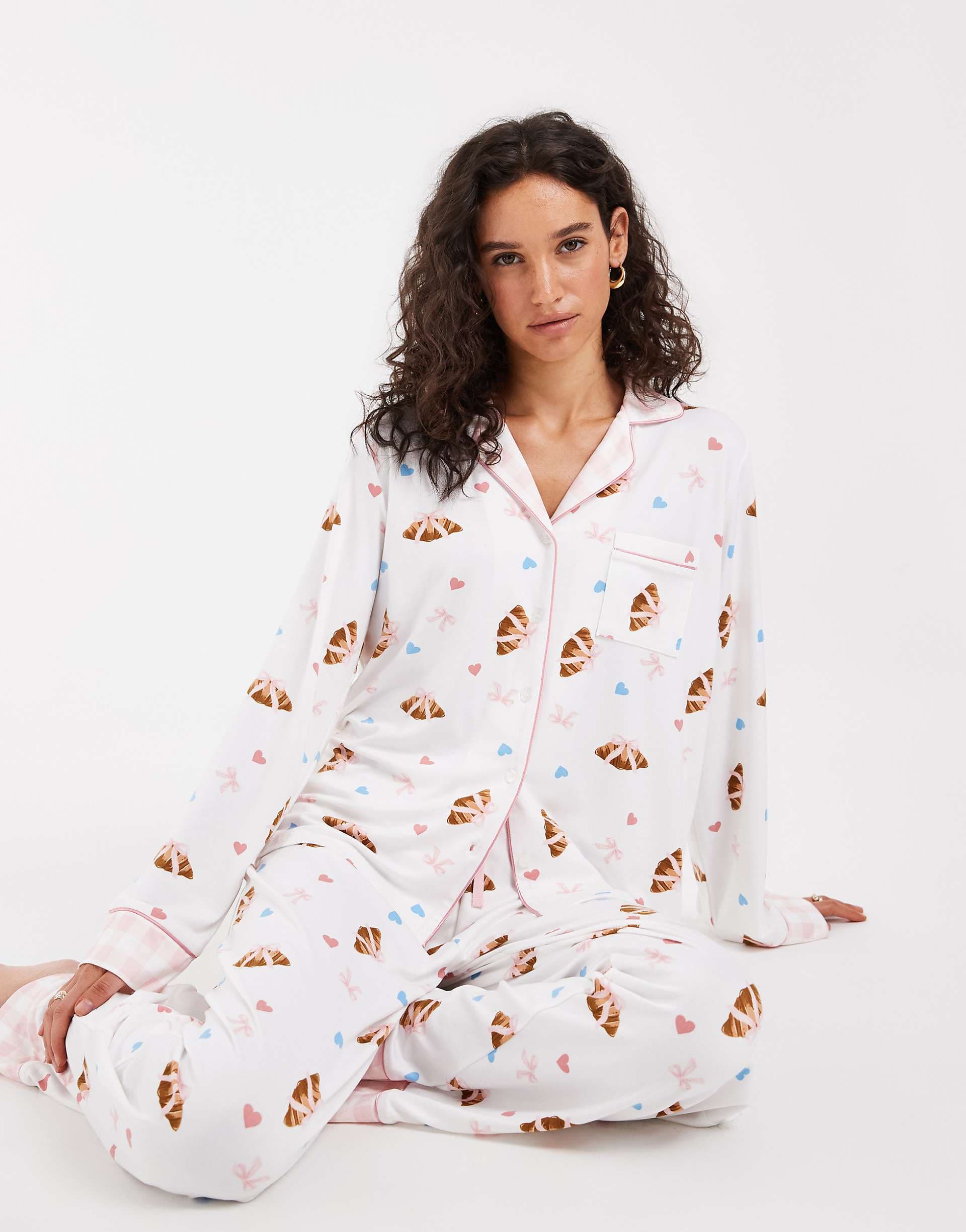Loungeable revere button up shirt and pants pajama set in croissant and bow print