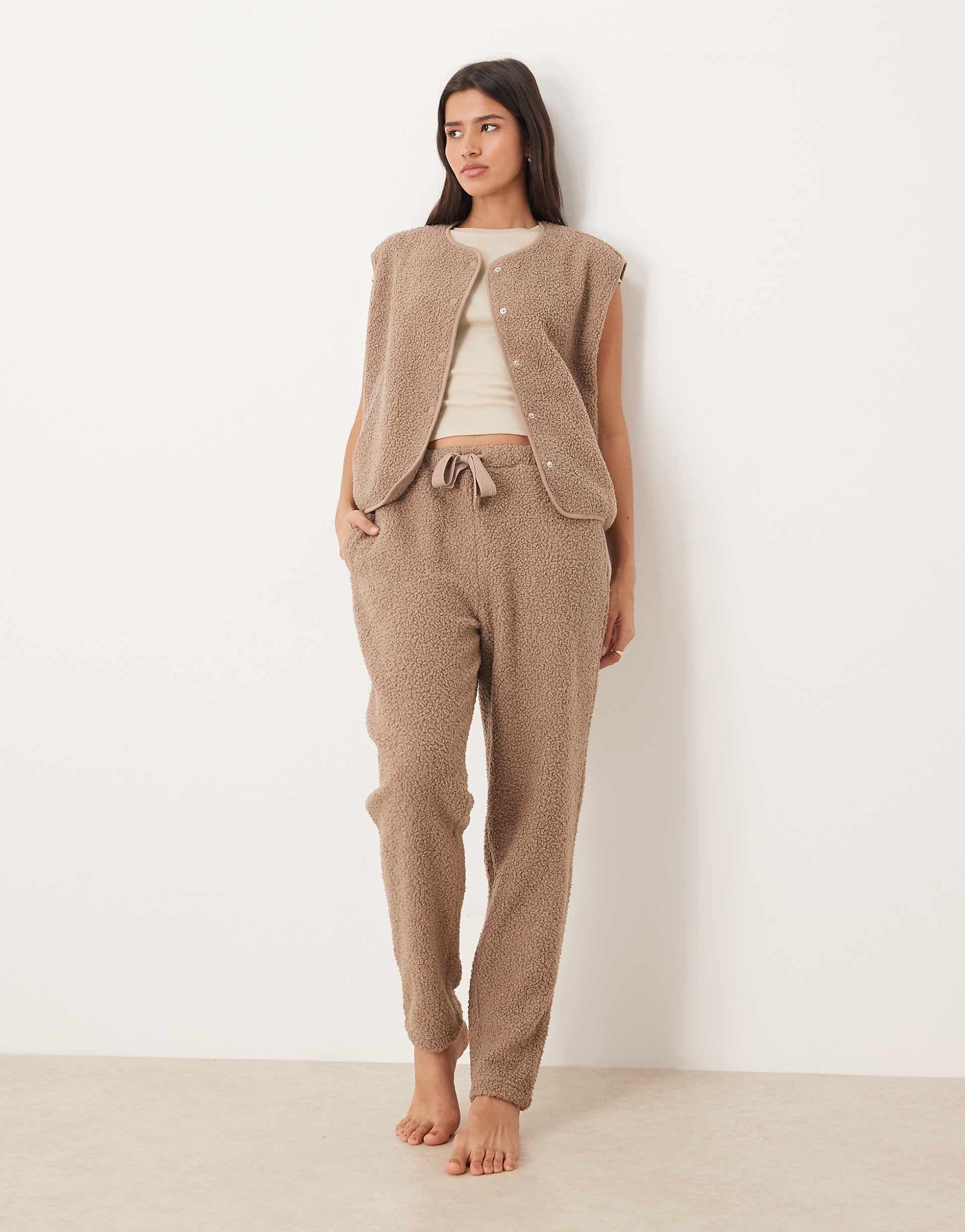 ASOS DESIGN faux shearling tapered sweatpants in mink