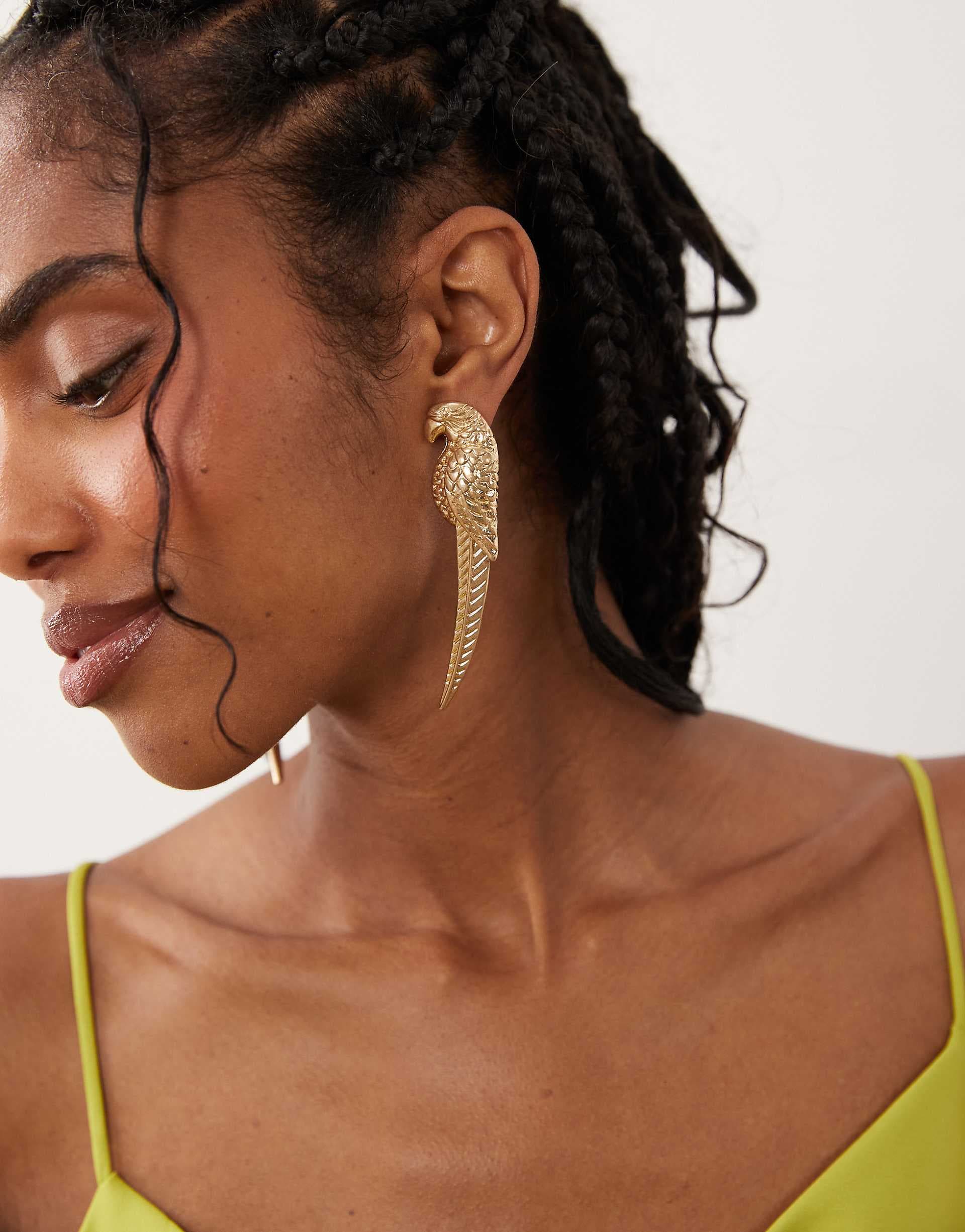 ASOS DESIGN stud earrings with parrot design in gold tone