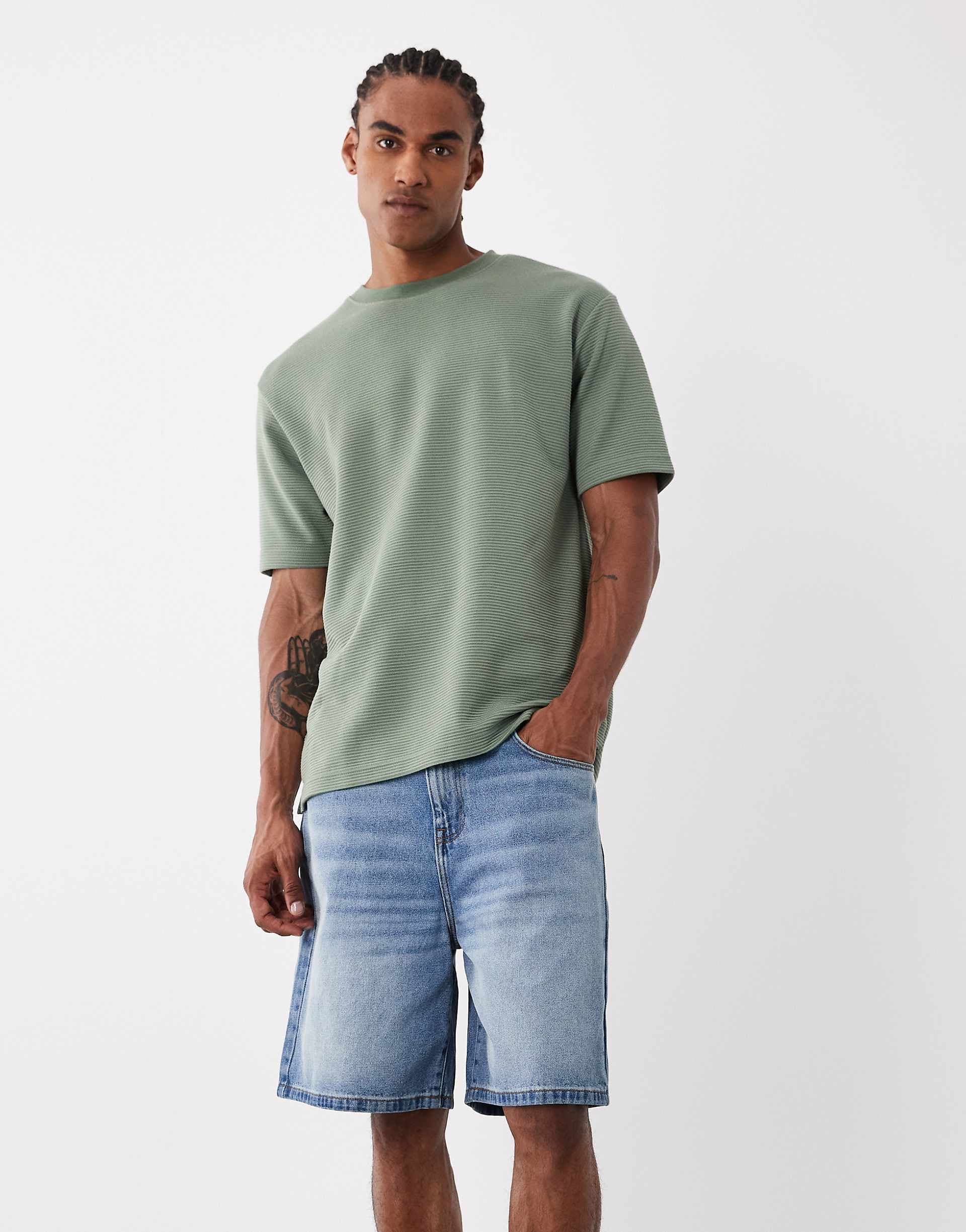 ASOS DESIGN mid length denim jorts in light wash blue