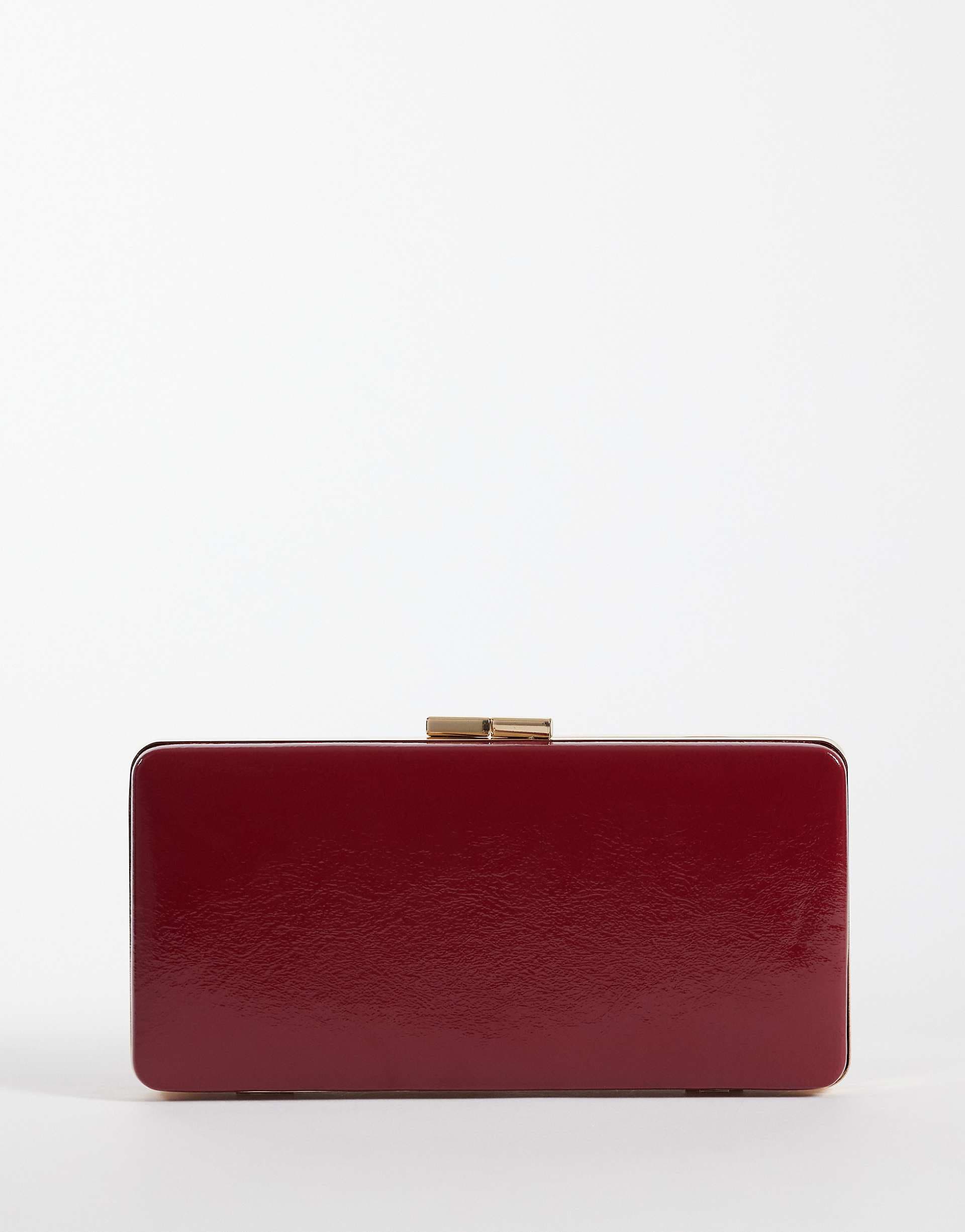 True Decadence clutch bag in deep red