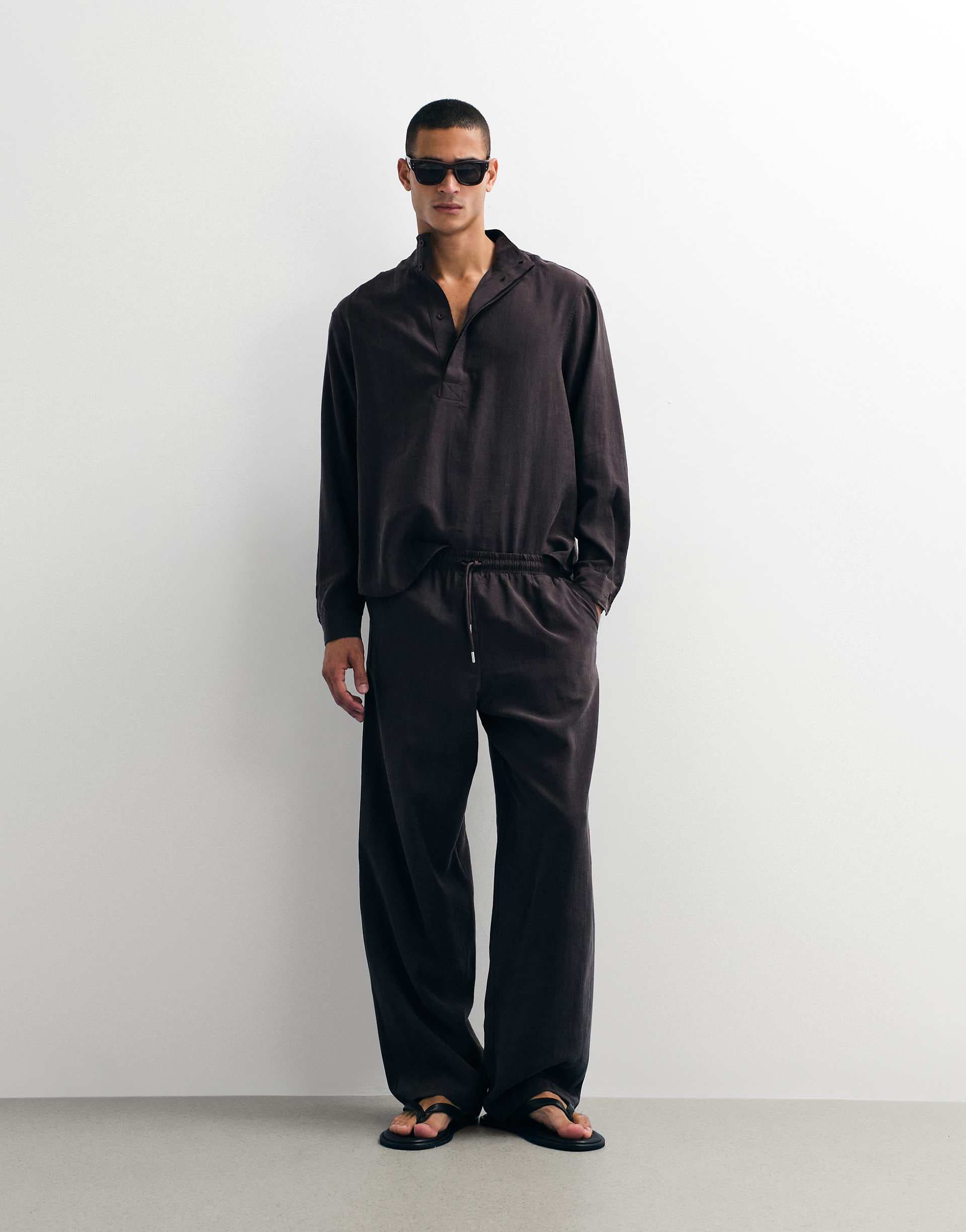 ASOS DESIGN wide leg flowing pants in brown - part of a set