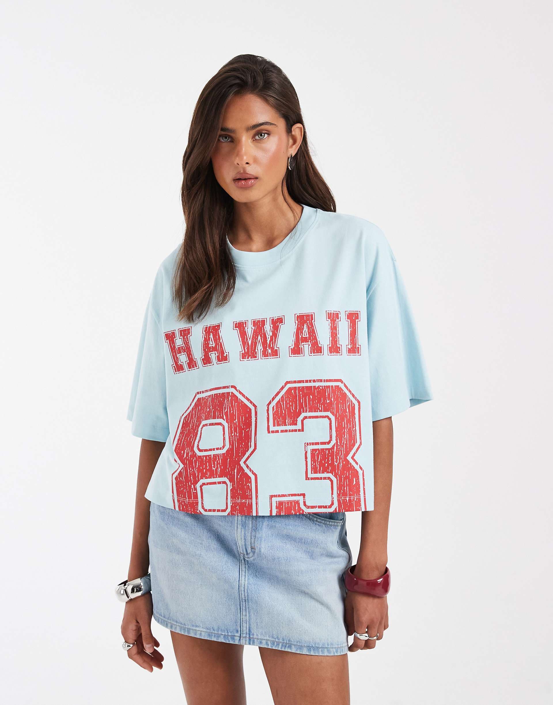ASOS DESIGN boxy crop tee with hawaii sports graphic in blue