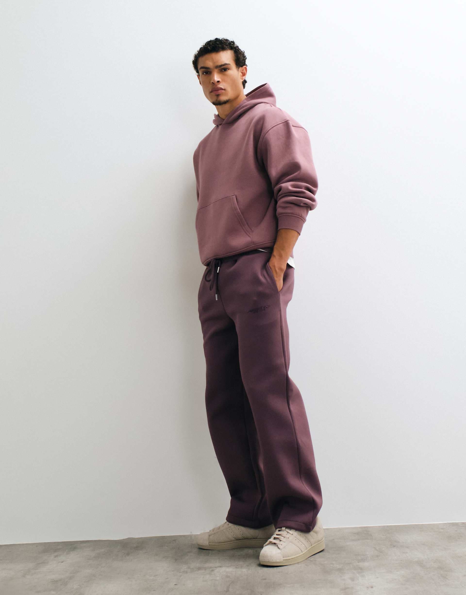 ASOS DESIGN wide leg sweatpants with embroidery in brown scuba-style fabric
