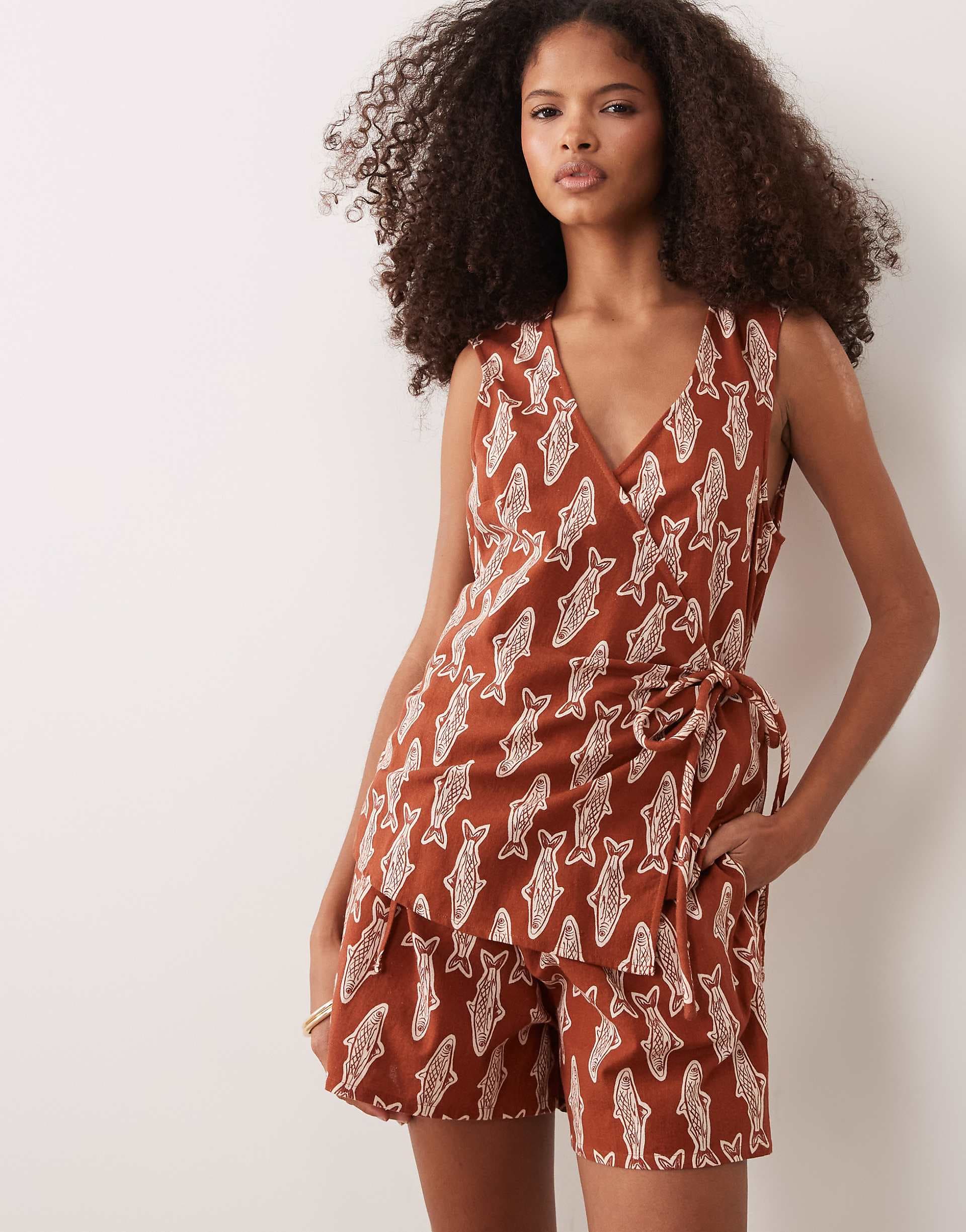 ASOS DESIGN wrap front romper in brown sardine print