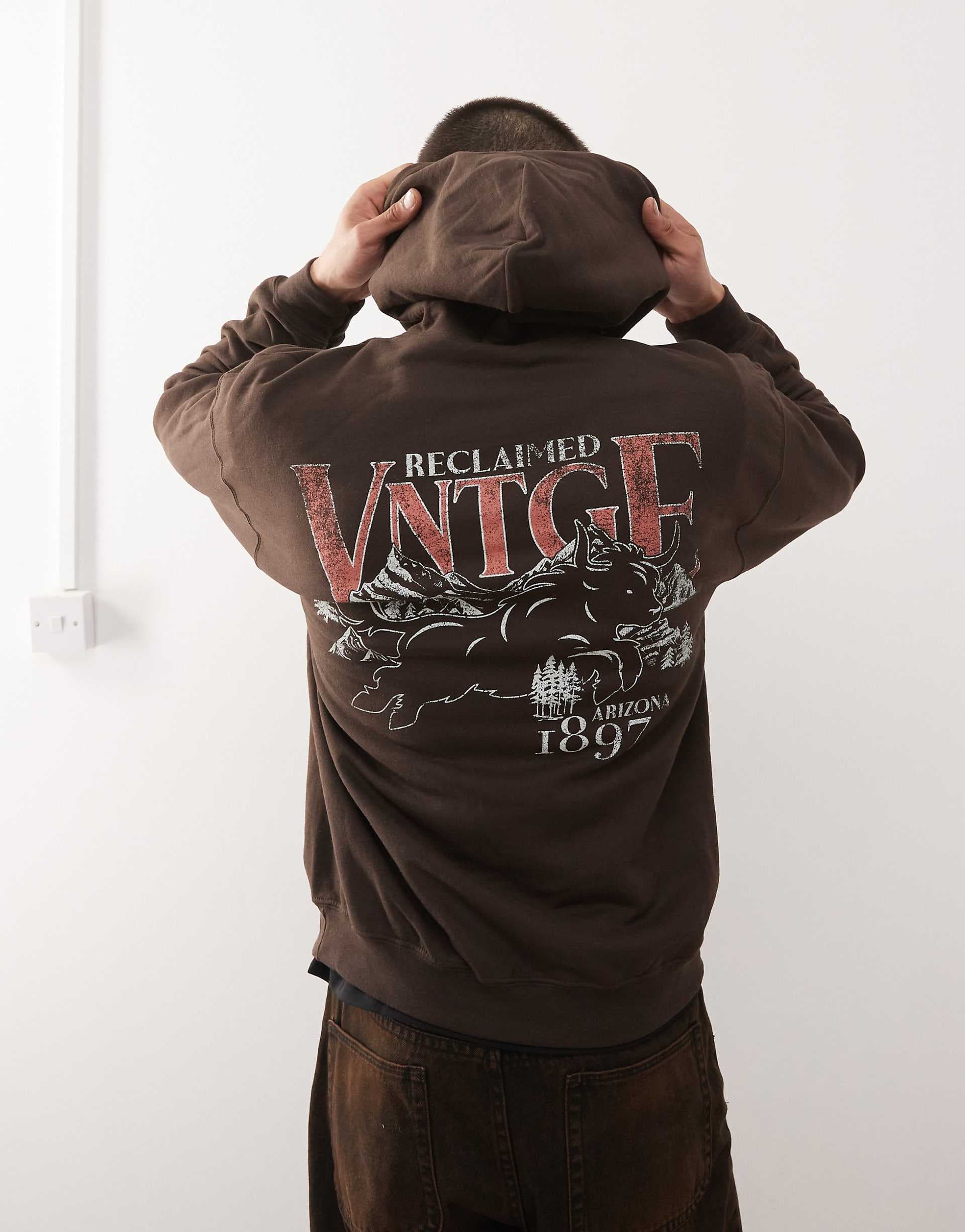 Reclaimed Vintage oversized hoodie with graphic back print in chocolate brown