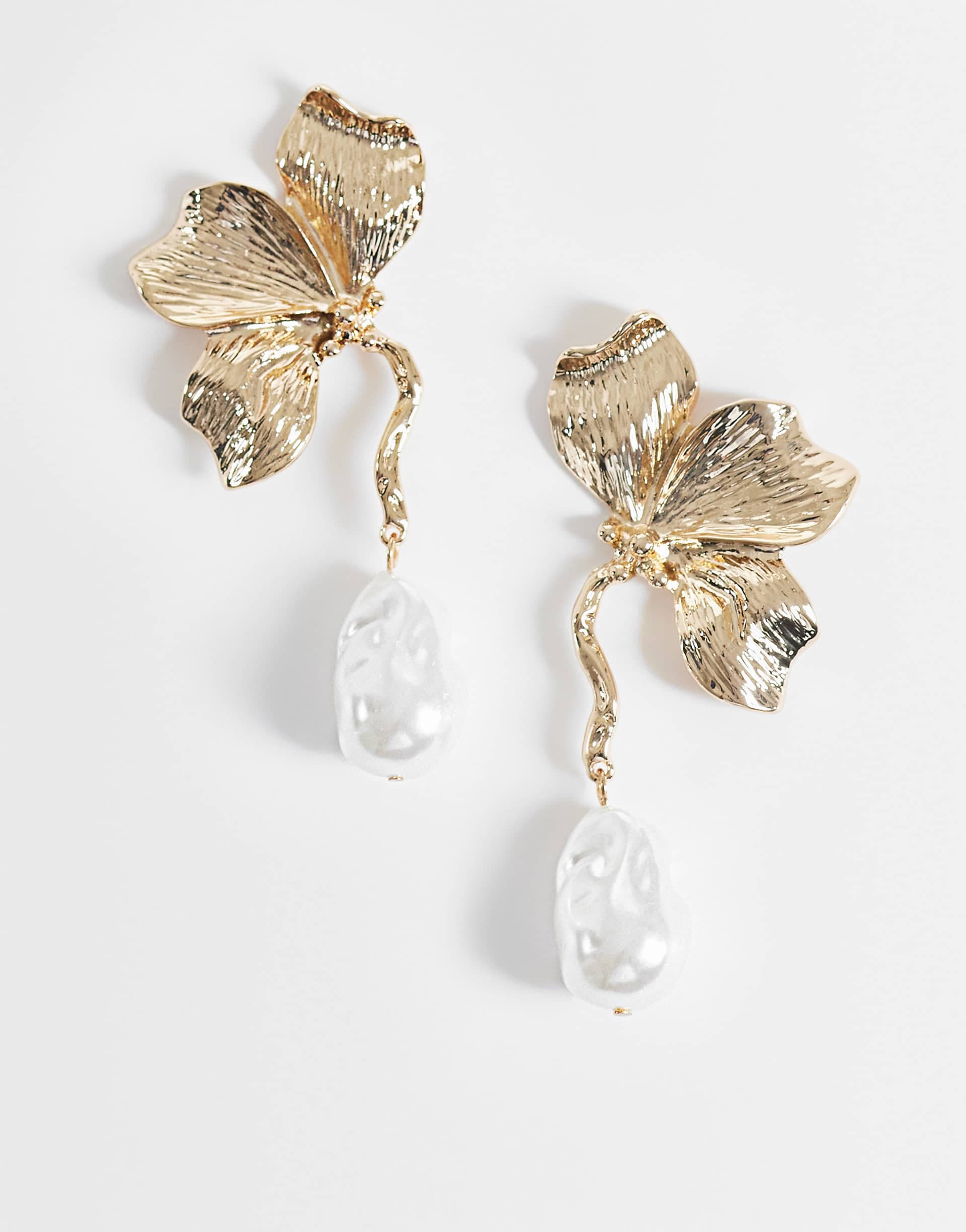 ASOS DESIGN floral pendant earrings with faux-pearl drops in gold tone